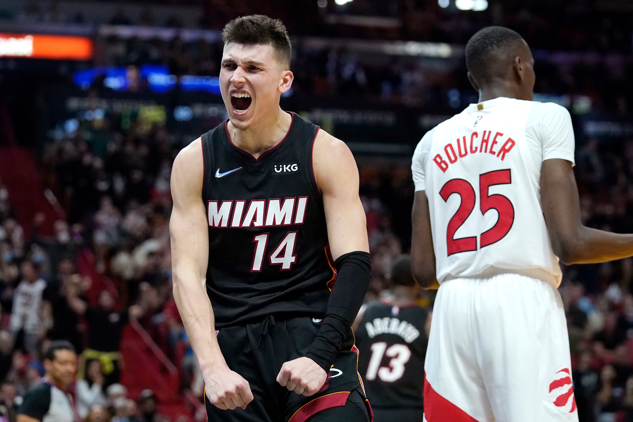 Miami Heat guard Tyler Herro (14) reacts during the second half of an NBA basketball game against the Toronto Raptors, Monday, Jan. 17, 2022, in Miami. (AP Photo/Lynne Sladky)