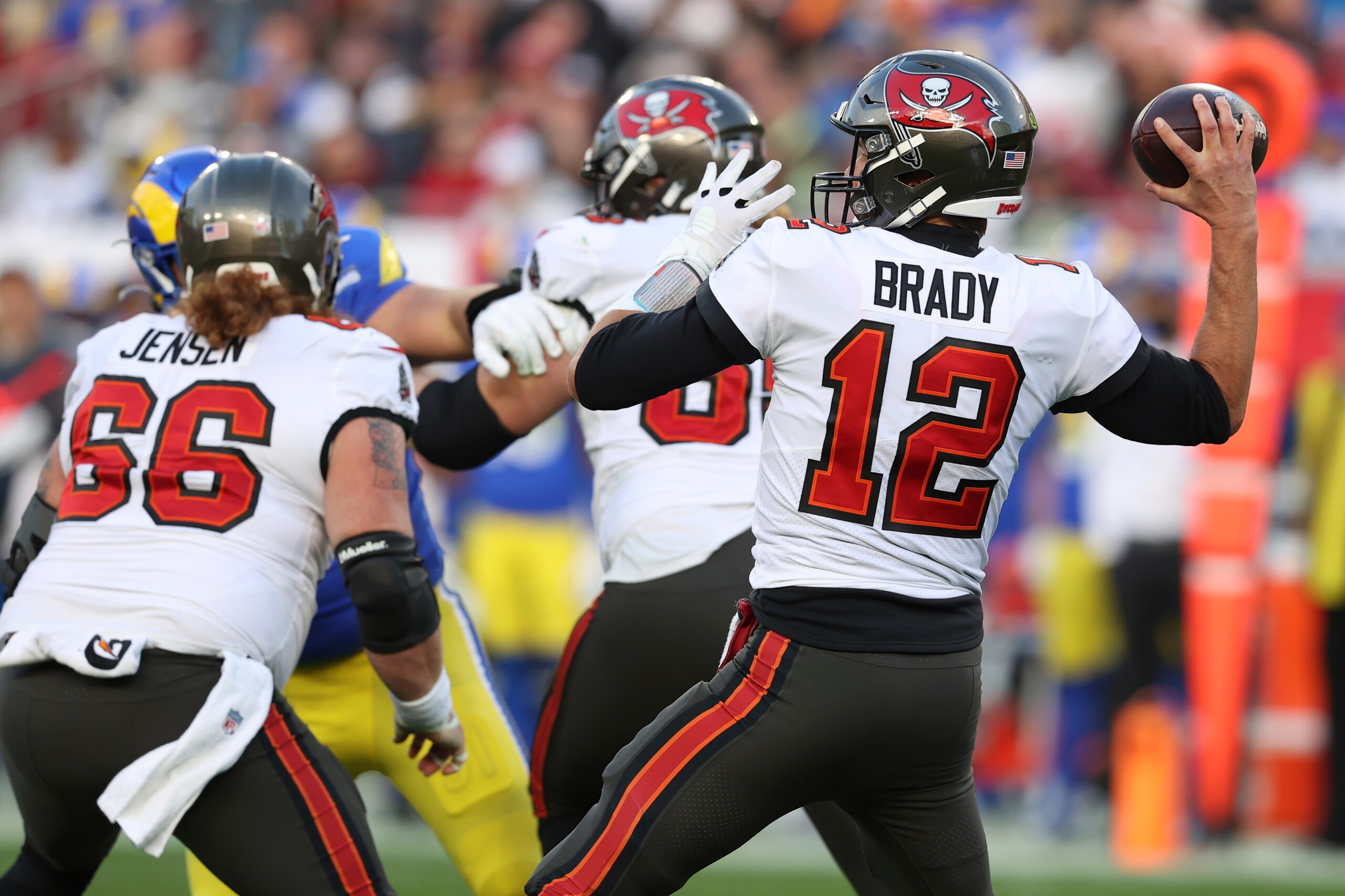 Tampa Bay Buccaneers quarterback Tom Brady (12) looks to pass against the Los Angeles Rams during the second half of an NFL divisional round playoff football game Sunday, Jan. 23, 2022, in Tampa, Fla. (AP Photo/Mark LoMoglio) Tampa Bay Buccaneers quarterback Tom Brady (12) looks to pass against the Los Angeles Rams during the second half of an NFL divisional round playoff football game Sunday, Jan. 23, 2022, in Tampa, Fla. (AP Photo/Mark LoMoglio)