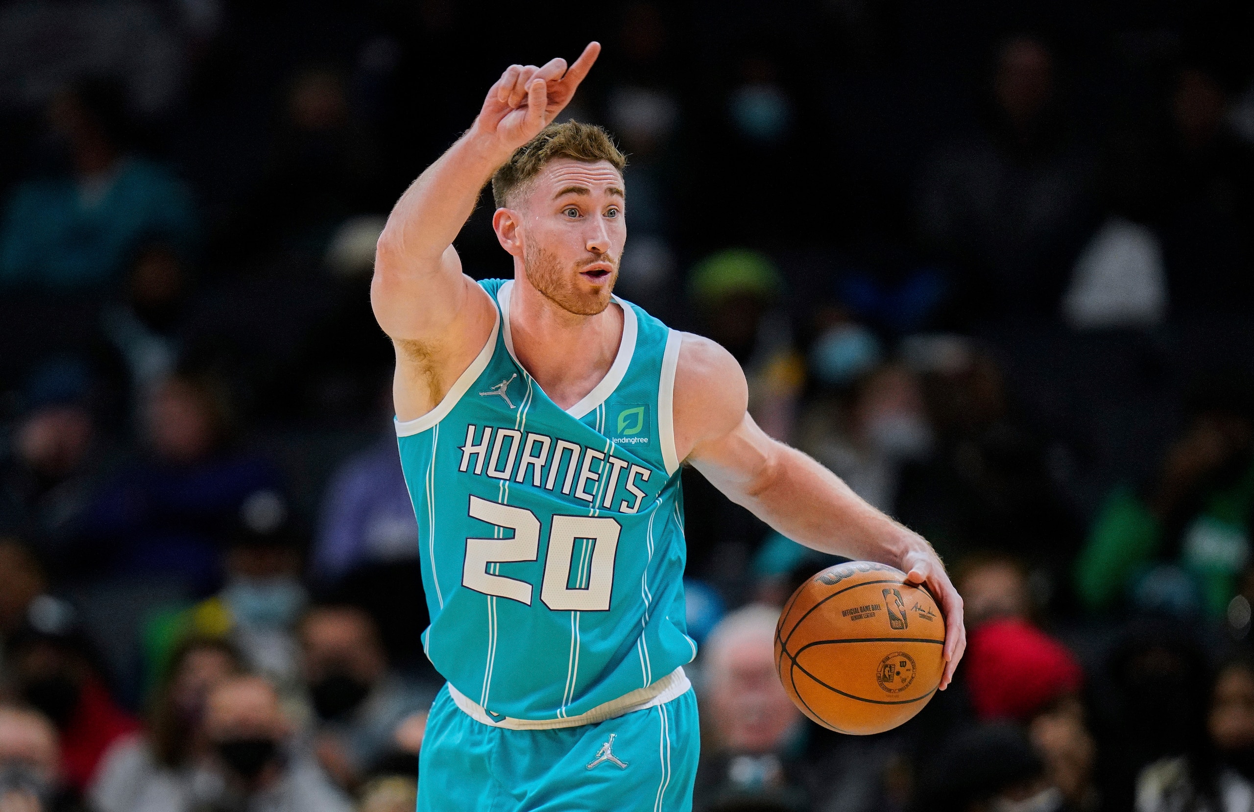 Charlotte Hornets forward Gordon Hayward (20) brings the ball up the court during an NBA basketball game against the Oklahoma City Thunder Friday, Jan. 21, 2022, in Charlotte, N.C. (AP Photo/Rusty Jones)