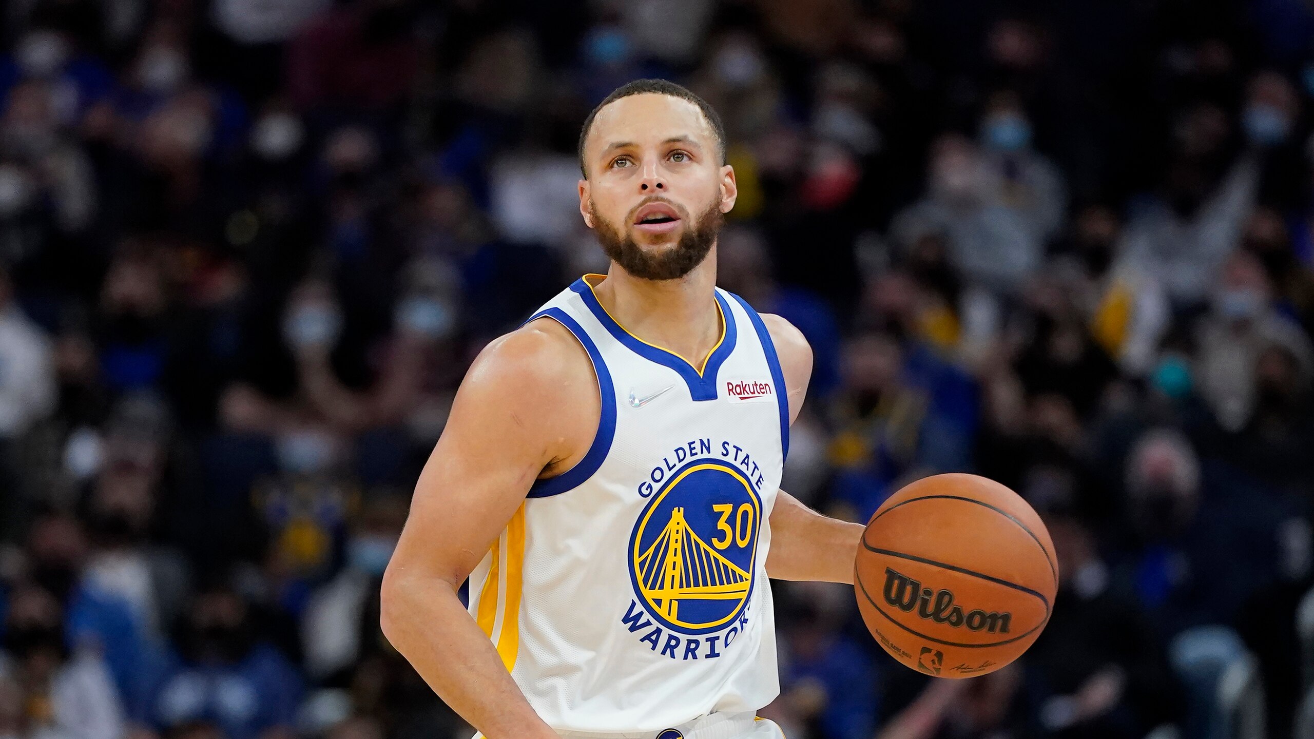 Golden State Warriors guard Stephen Curry against the Houston Rockets during an NBA basketball game in San Francisco, Friday, Jan. 21, 2022. (AP Photo/Jeff Chiu)
