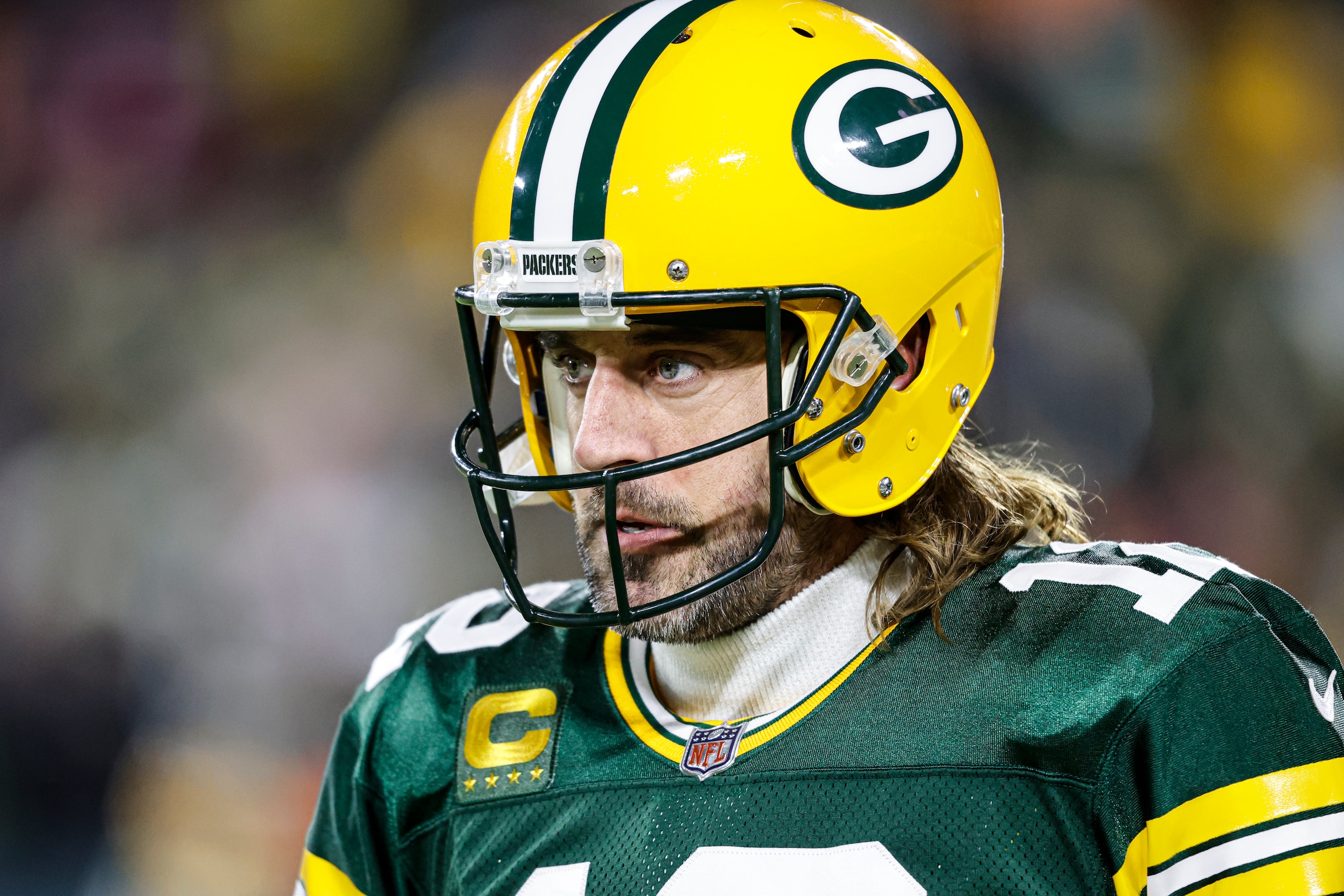 Green Bay Packers quarterback Aaron Rodgers (12) warms up before an NFL divisional playoff football game against the San Francisco 49ers, Saturday, Jan 22. 2022, in Green Bay, Wis. (AP Photo/Jeffrey Phelps)