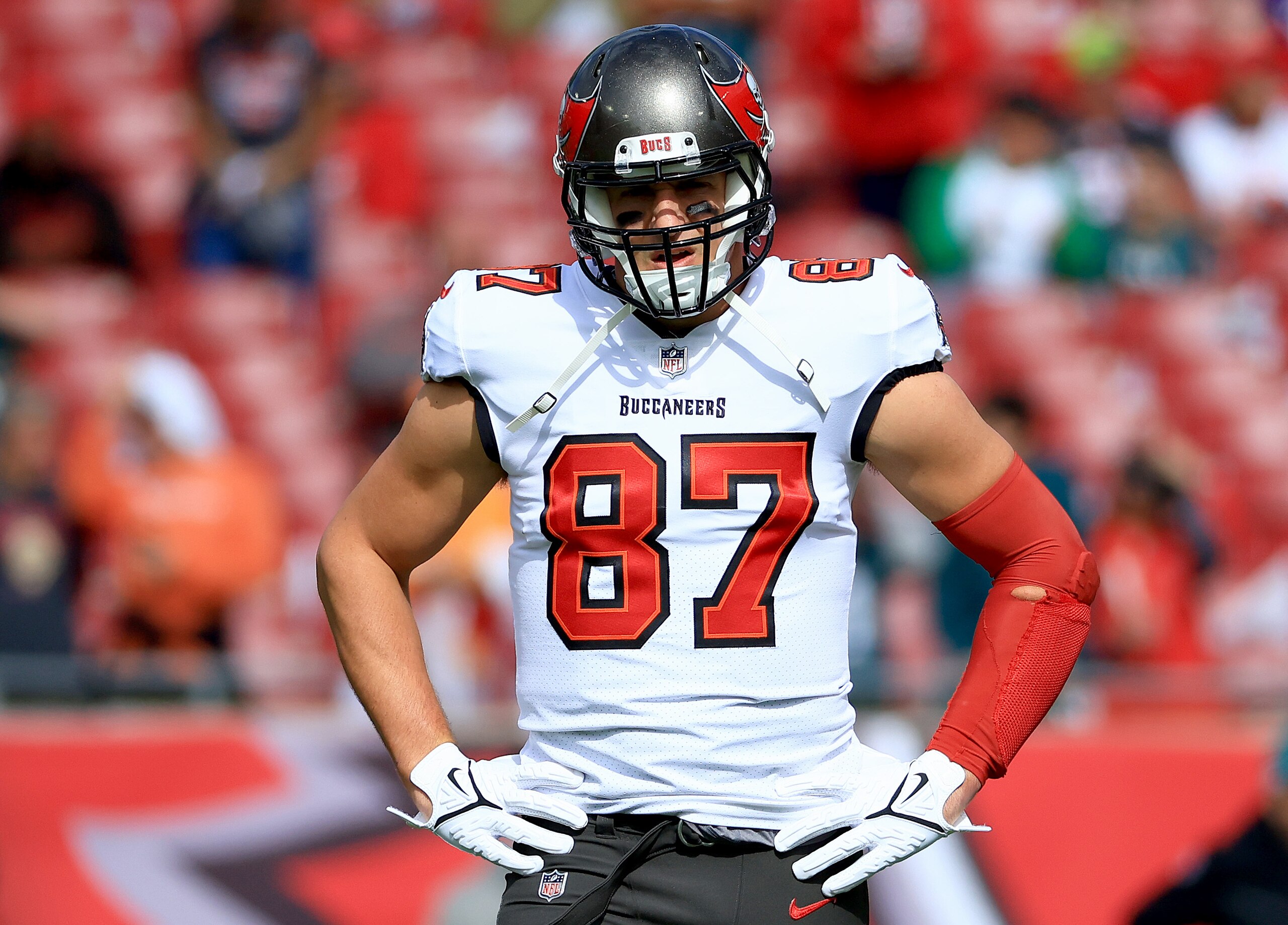 TAMPA, FLORIDA - JANUARY 16: Rob Gronkowski #87 of the Tampa Bay Buccaneers warms up prior to the NFC Wild Card Playoff game against the Philadelphia Eagles at Raymond James Stadium on January 16, 2022 in Tampa, Florida. (Photo by Mike Ehrmann/Getty Images)