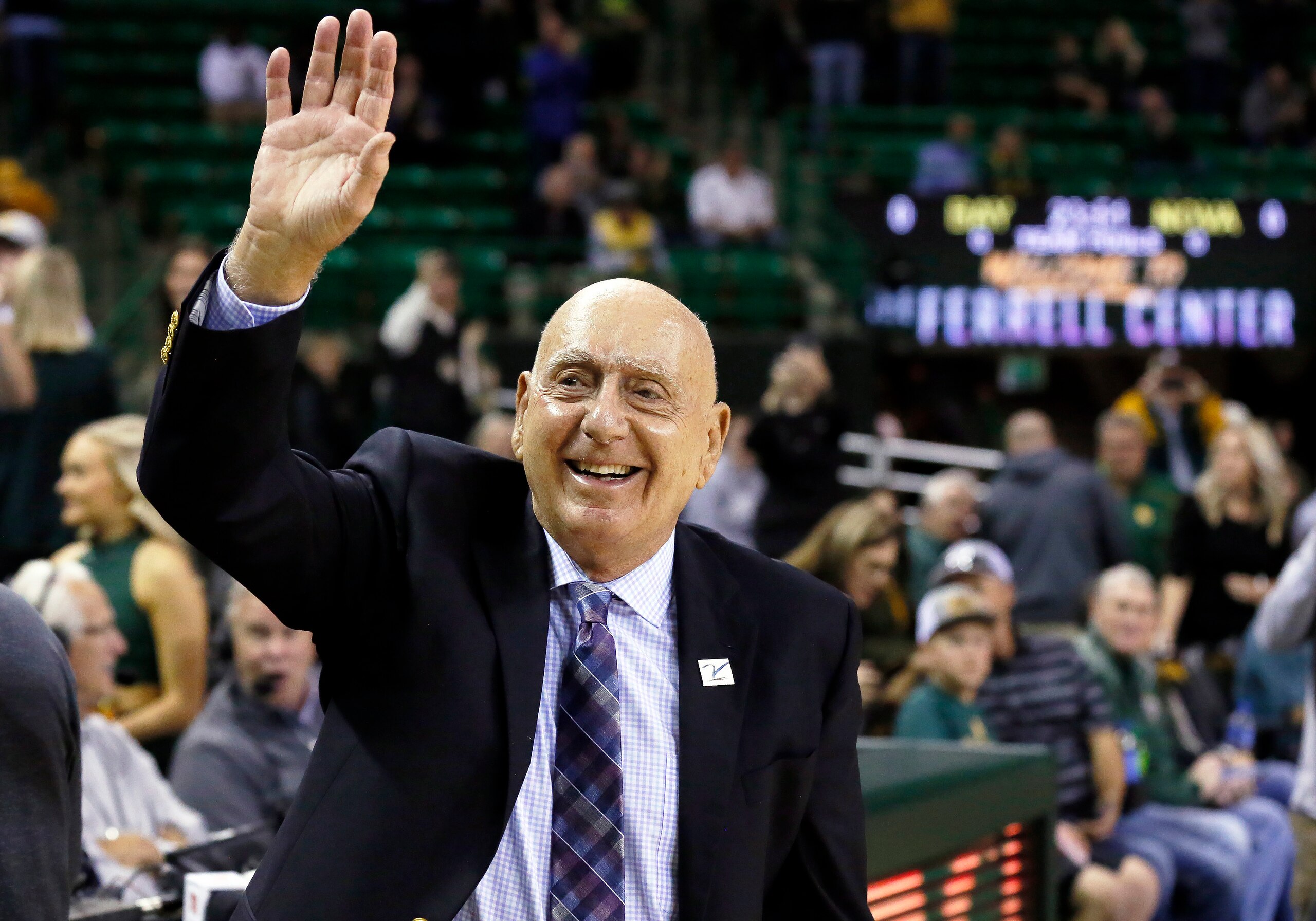 ABC/ESPN basketball analyst Dick Vitale waves to the crowd prior to an NCAA college basketball game between Baylor and Villanova, Sunday, Dec. 12, 2021, in Waco, Texas. (AP Photo/Ray Carlin)