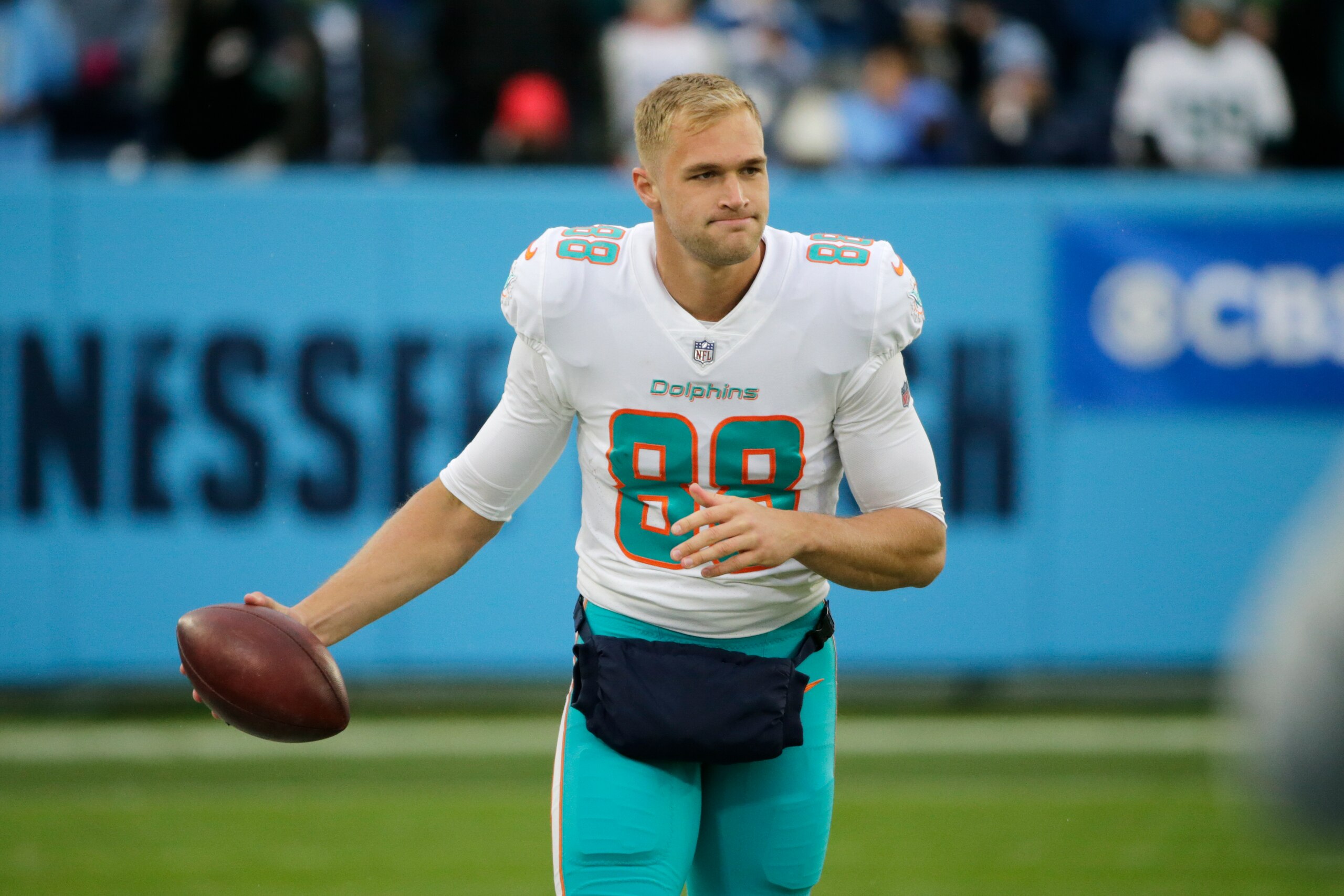 Miami Dolphins tight end Mike Gesicki (88) warms up before an NFL football game against the Tennessee Titans Sunday, Jan. 2, 2022, in Nashville, Tenn. (AP Photo/James Kenney)