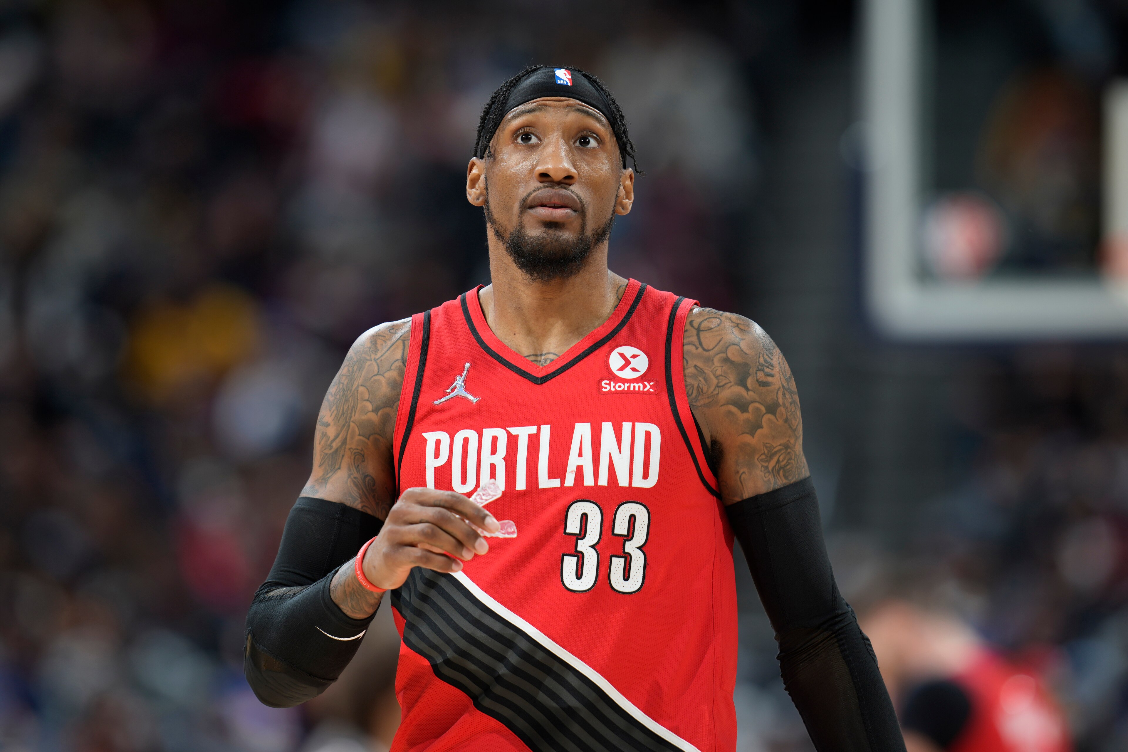 Portland Trail Blazers forward Robert Covington (33) in the second half of an NBA basketball game Thursday, Jan. 13, 2022, in Denver. The Nuggets won 140-108. (AP Photo/David Zalubowski)