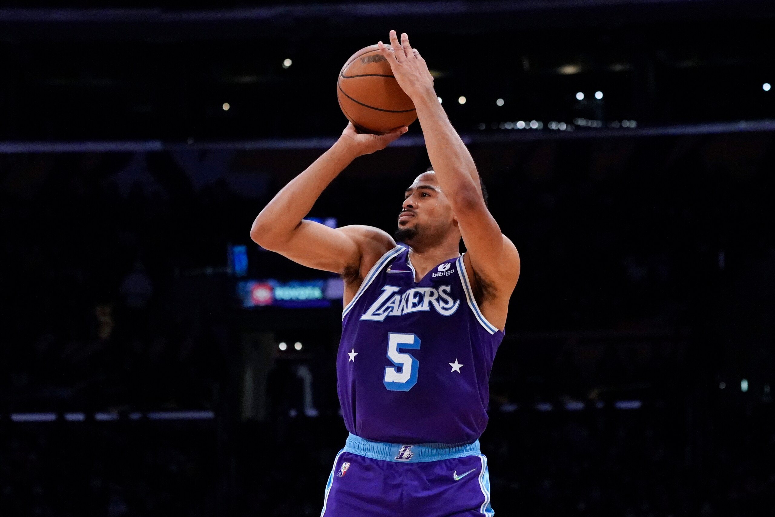 Los Angeles Lakers guard Talen Horton-Tucker (5) shoots during an NBA basketball game against the Atlanta Hawks in Los Angeles, Friday, Jan. 7, 2022. (AP Photo/Ashley Landis)