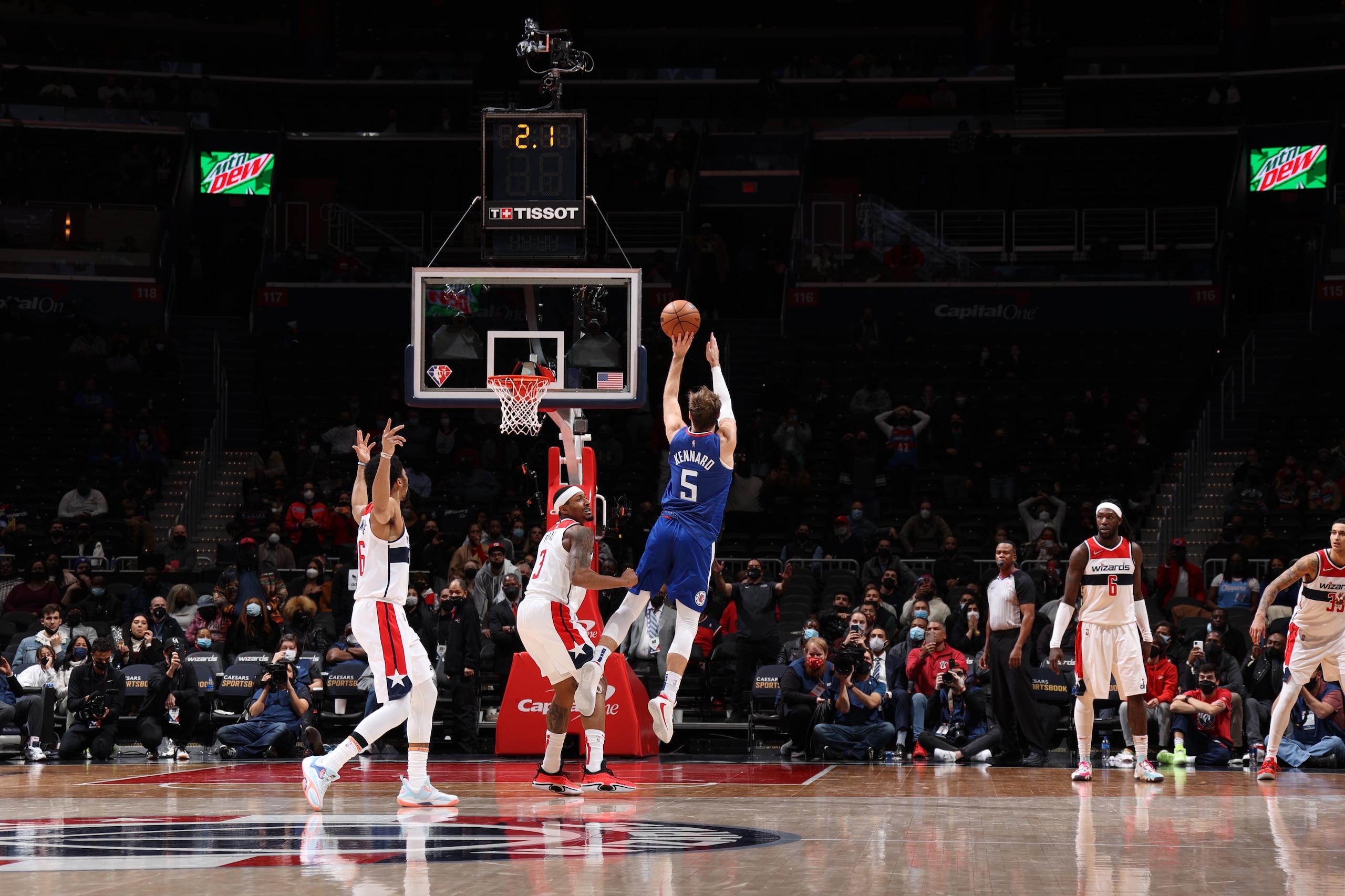 WASHINGTON, DC - JANUARY 25: Luke Kennard #5 of the LA Clippers shoots a three point basket to win the game against the Washington Wizards on January 25, 2022 at Capital One Arena in Washington, DC. NOTE TO USER: User expressly acknowledges and agrees that, by downloading and or using this Photograph, user is consenting to the terms and conditions of the Getty Images License Agreement. Mandatory Copyright Notice: Copyright 2022 NBAE (Photo by Stephen Gosling/NBAE via Getty Images) WASHINGTON, DC - JANUARY 25: Luke Kennard #5 of the LA Clippers shoots a three point basket to win the game against the Washington Wizards on January 25, 2022 at Capital One Arena in Washington, DC. NOTE TO USER: User expressly acknowledges and agrees that, by downloading and or using this Photograph, user is consenting to the terms and conditions of the Getty Images License Agreement. Mandatory Copyright Notice: Copyright 2022 NBAE (Photo by Stephen Gosling/NBAE via Getty Images)