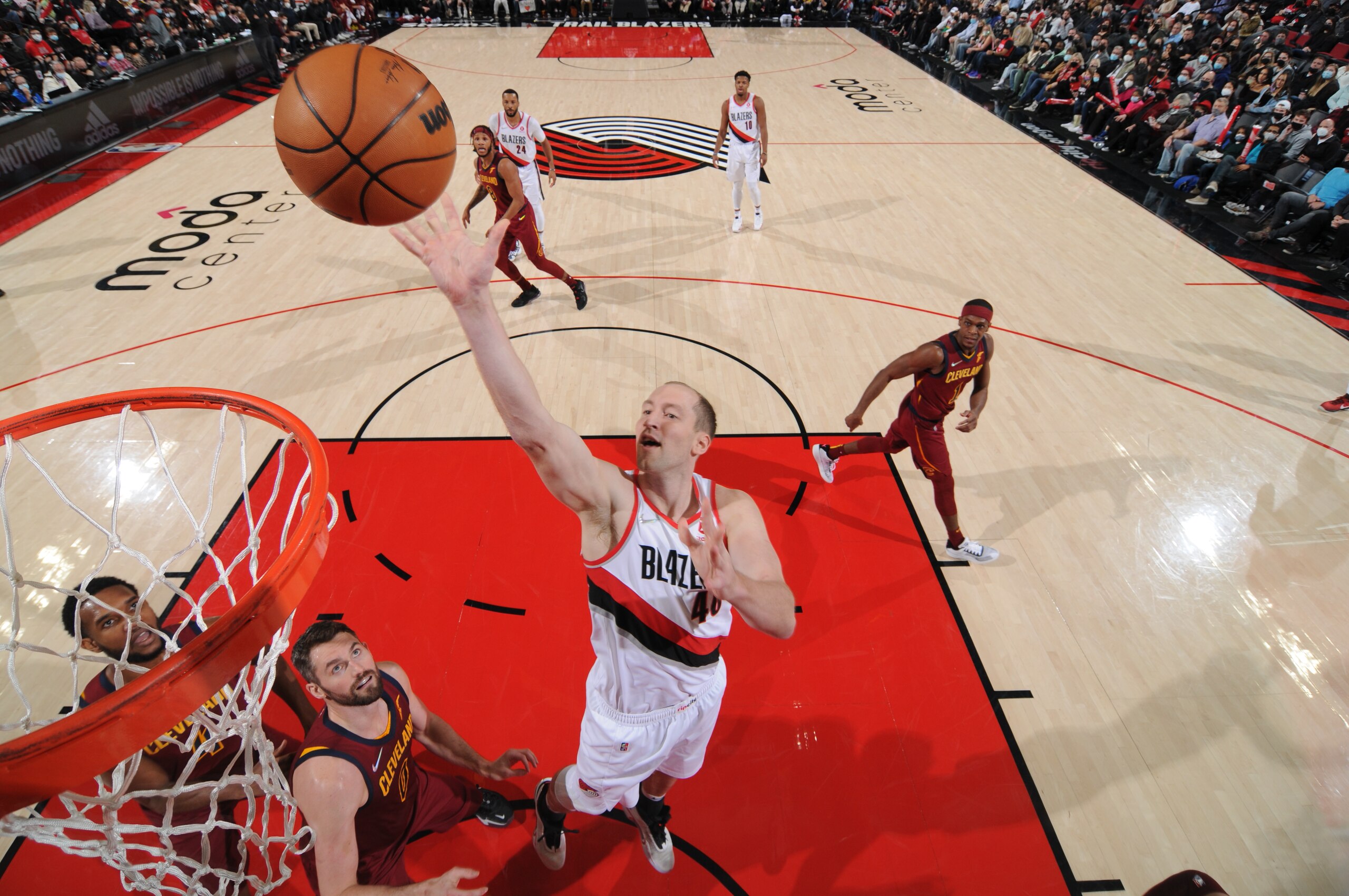 PORTLAND, OR - JANUARY 7: Cody Zeller #40 of the Portland Trail Blazers drives to the basket during the game against the Cleveland Cavaliers on January 7, 2022 at the Moda Center Arena in Portland, Oregon. NOTE TO USER: User expressly acknowledges and agrees that, by downloading and or using this photograph, user is consenting to the terms and conditions of the Getty Images License Agreement. Mandatory Copyright Notice: Copyright 2022 NBAE (Photo by Cameron Browne/NBAE via Getty Images)