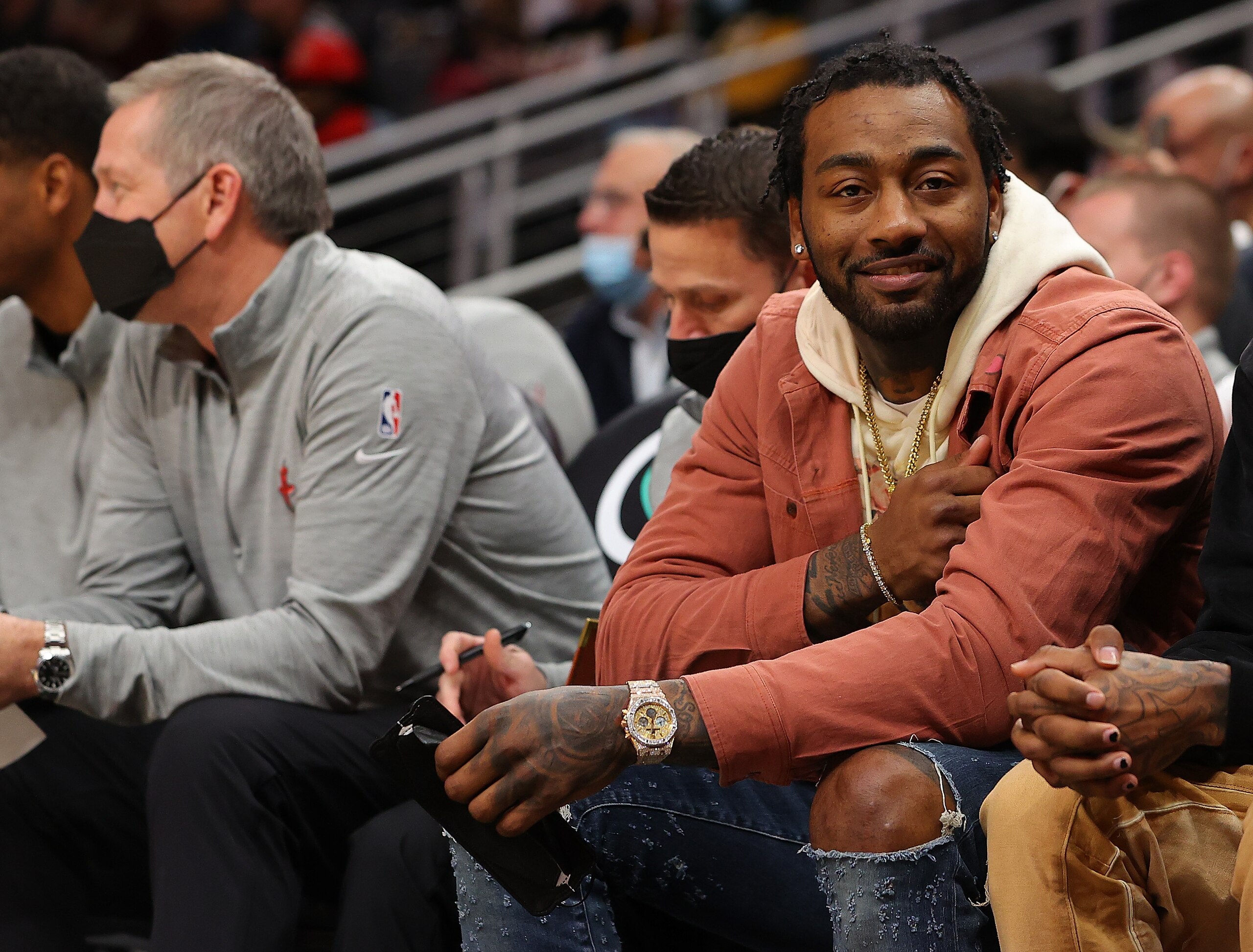 ATLANTA, GEORGIA - DECEMBER 13:  John Wall #1 of the Houston Rockets reacts prior to tip-off against the Atlanta Hawks at State Farm Arena on December 13, 2021 in Atlanta, Georgia.  NOTE TO USER: User expressly acknowledges and agrees that, by downloading and or using this photograph, User is consenting to the terms and conditions of the Getty Images License Agreement.  (Photo by Kevin C. Cox/Getty Images)