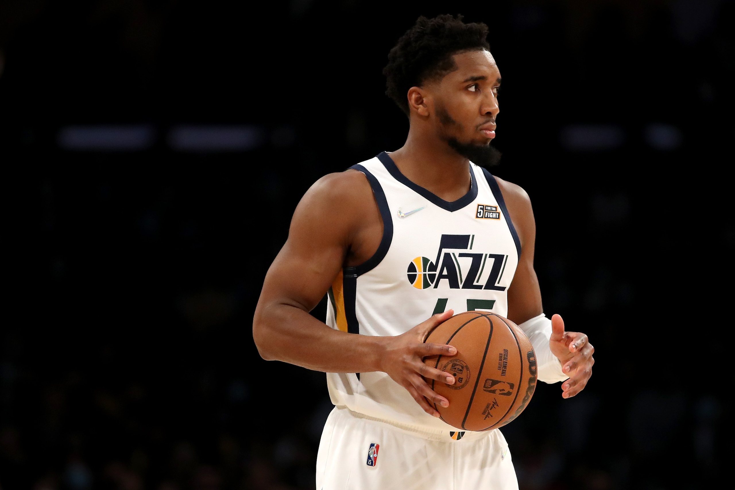 LOS ANGELES, CALIFORNIA - JANUARY 17: Donovan Mitchell #45 of the Utah Jazz looks on during the fourth quarter against the Los Angeles Lakers at Crypto.com Arena on January 17, 2022 in Los Angeles, California. NOTE TO USER: User expressly acknowledges and agrees that, by downloading and/or using this photograph, User is consenting to the terms and conditions of the Getty Images License Agreement. (Photo by Katelyn Mulcahy/Getty Images)