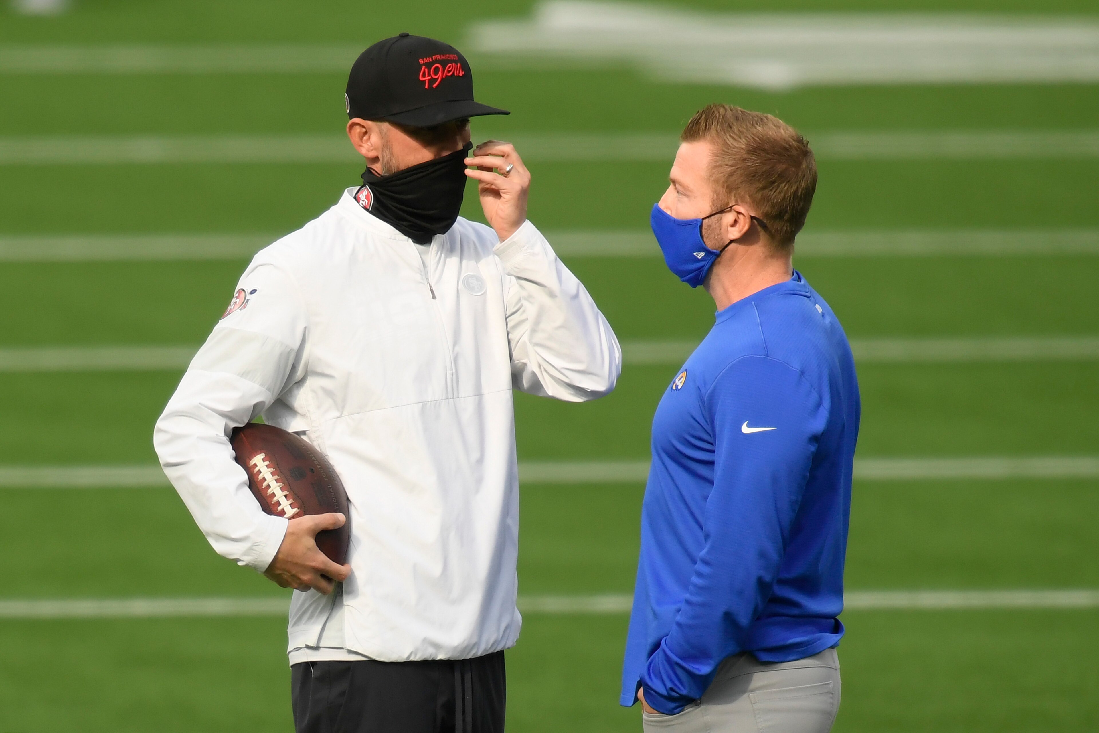 INGLEWOOD, CALIFORNIA - NOVEMBER 29: Head coach Kyle Shanahan of the San Francisco 49ers talks with head coach Sean McVay of the Los Angeles Rams before their game at SoFi Stadium on November 29, 2020 in Inglewood, California. (Photo by Harry How/Getty Images) INGLEWOOD, CALIFORNIA - NOVEMBER 29: Head coach Kyle Shanahan of the San Francisco 49ers talks with head coach Sean McVay of the Los Angeles Rams before their game at SoFi Stadium on November 29, 2020 in Inglewood, California. (Photo by Harry How/Getty Images)