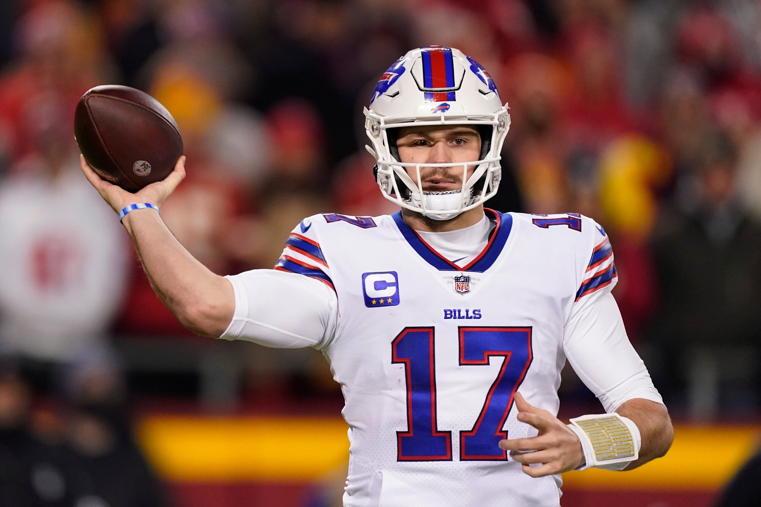 Buffalo Bills quarterback Josh Allen (17) throws a pass during the first half of an NFL divisional round playoff football game against the Kansas City Chiefs, Sunday, Jan. 23, 2022, in Kansas City, Mo. (AP Photo/Charlie Riedel)