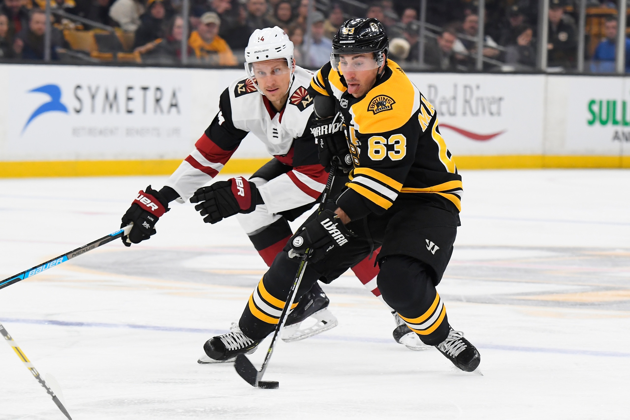 BOSTON, MA - DECEMBER 11: Brad Marchand #63 of the Boston Bruins skates with the puck against the Arizona Coyotes at the TD Garden on December 11, 2018 in Boston, Massachusetts. (Photo by Brian Babineau/NHLI via Getty Images)