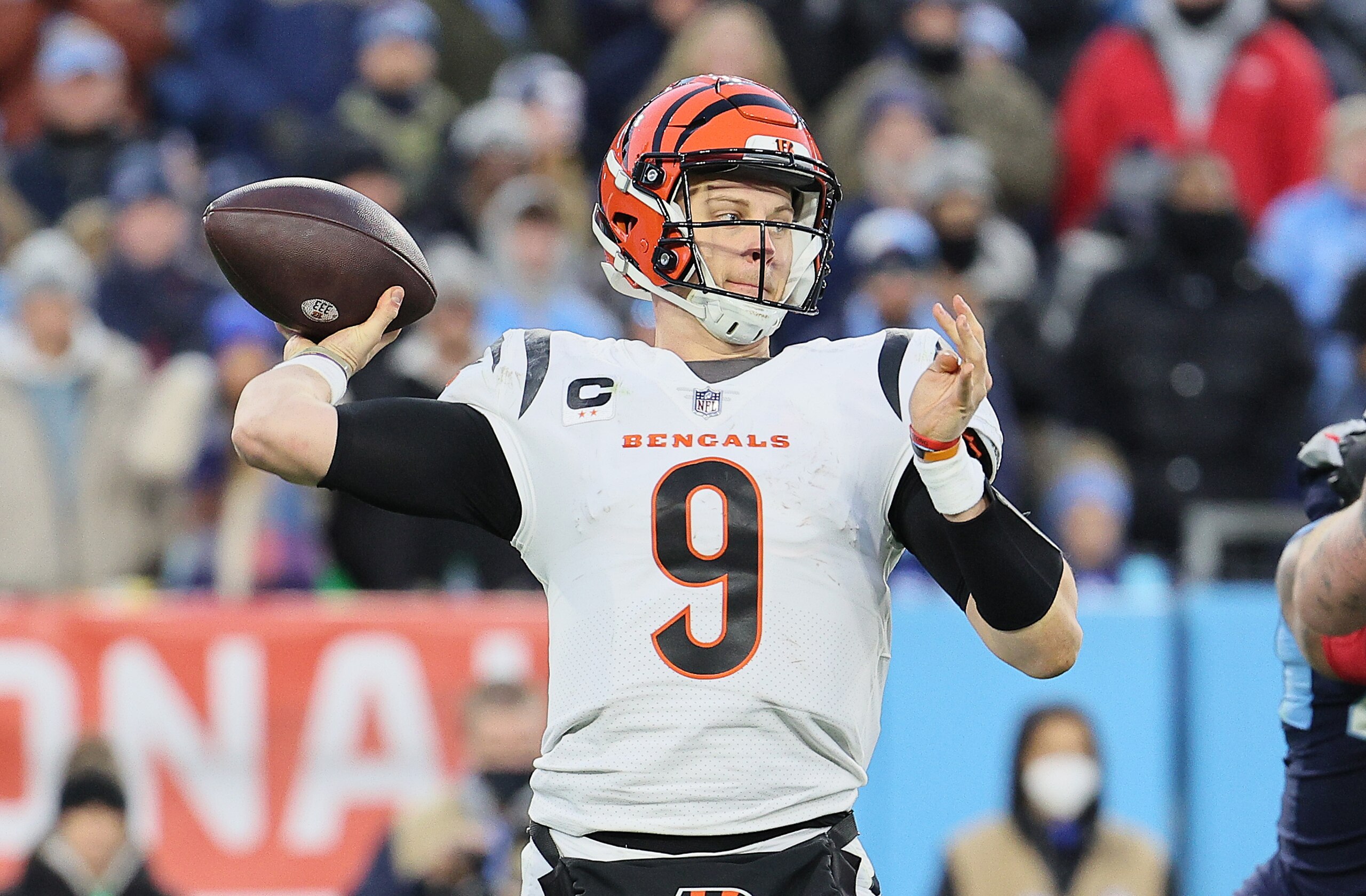 NASHVILLE, TENNESSEE - JANUARY 22: Joe Burrow #9 of the Cincinnati Bengals against the Tennessee Titans during the AFC Divisional Playoff at Nissan Stadium on January 22, 2022 in Nashville, Tennessee. (Photo by Andy Lyons/Getty Images)