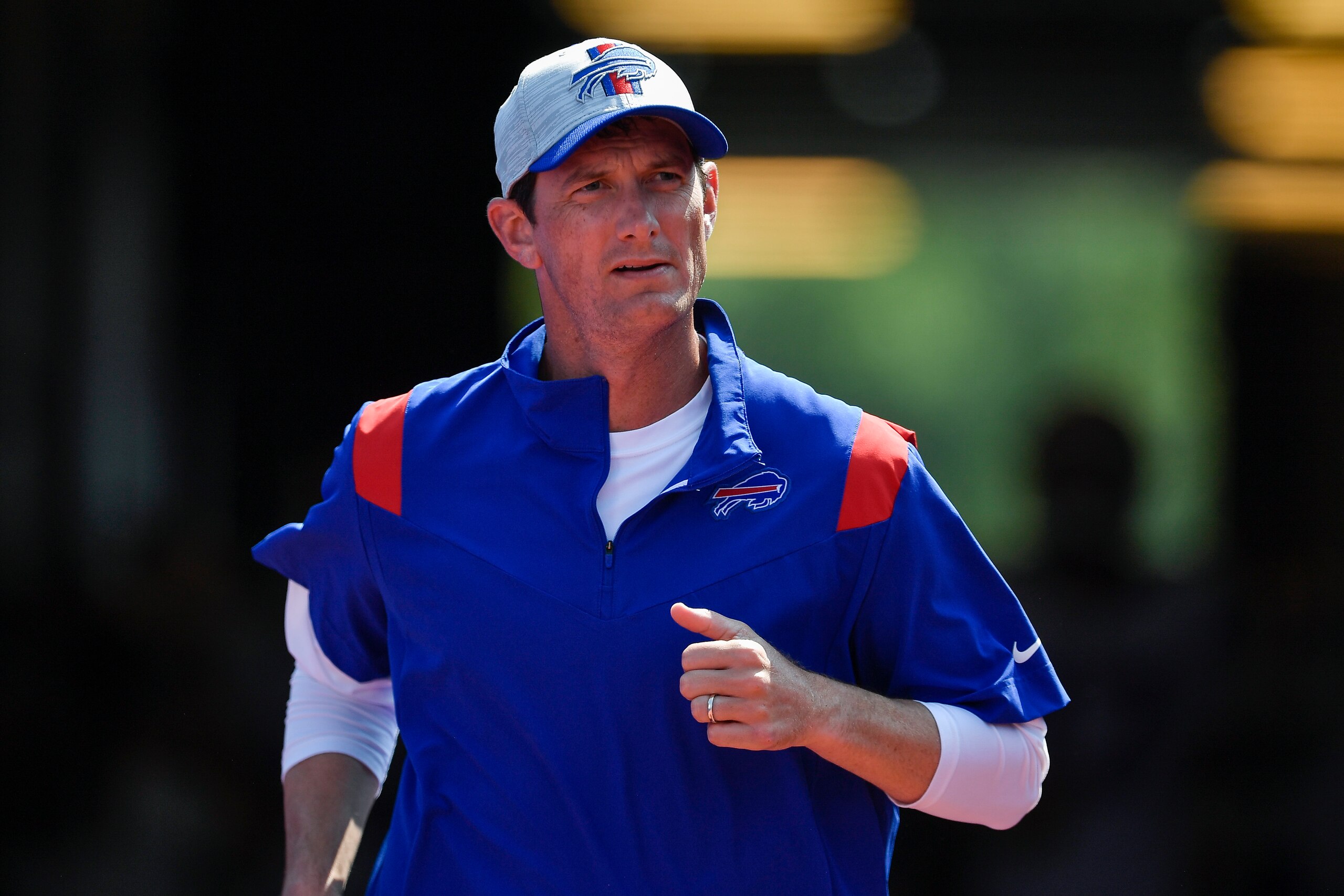 Buffalo Bills quarterbacks coach Ken Dorsey runs on the field before a preseason NFL football game against the Green Bay Packers in Orchard Park, N.Y., Saturday, Aug. 28, 2021. (AP Photo/Adrian Kraus)