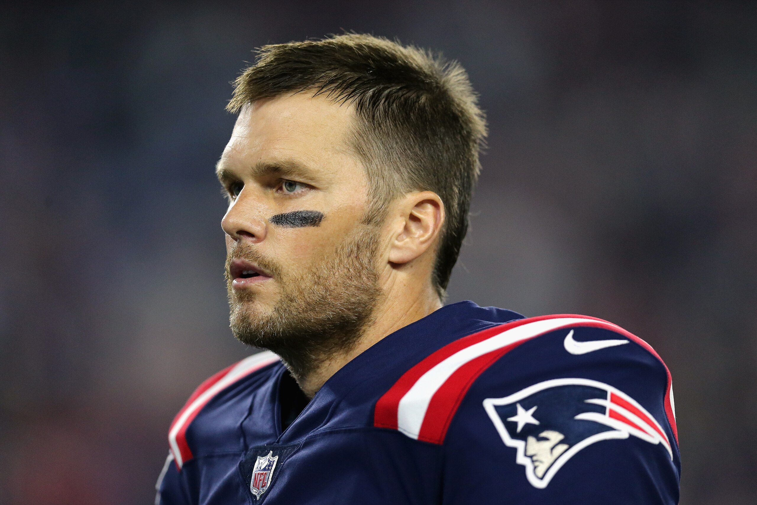 FOXBOROUGH, MA - OCTOBER 04:  Tom Brady #12 of the New England Patriots looks on before the game against the Indianapolis Colts at Gillette Stadium on October 4, 2018 in Foxborough, Massachusetts.  (Photo by Maddie Meyer/Getty Images)