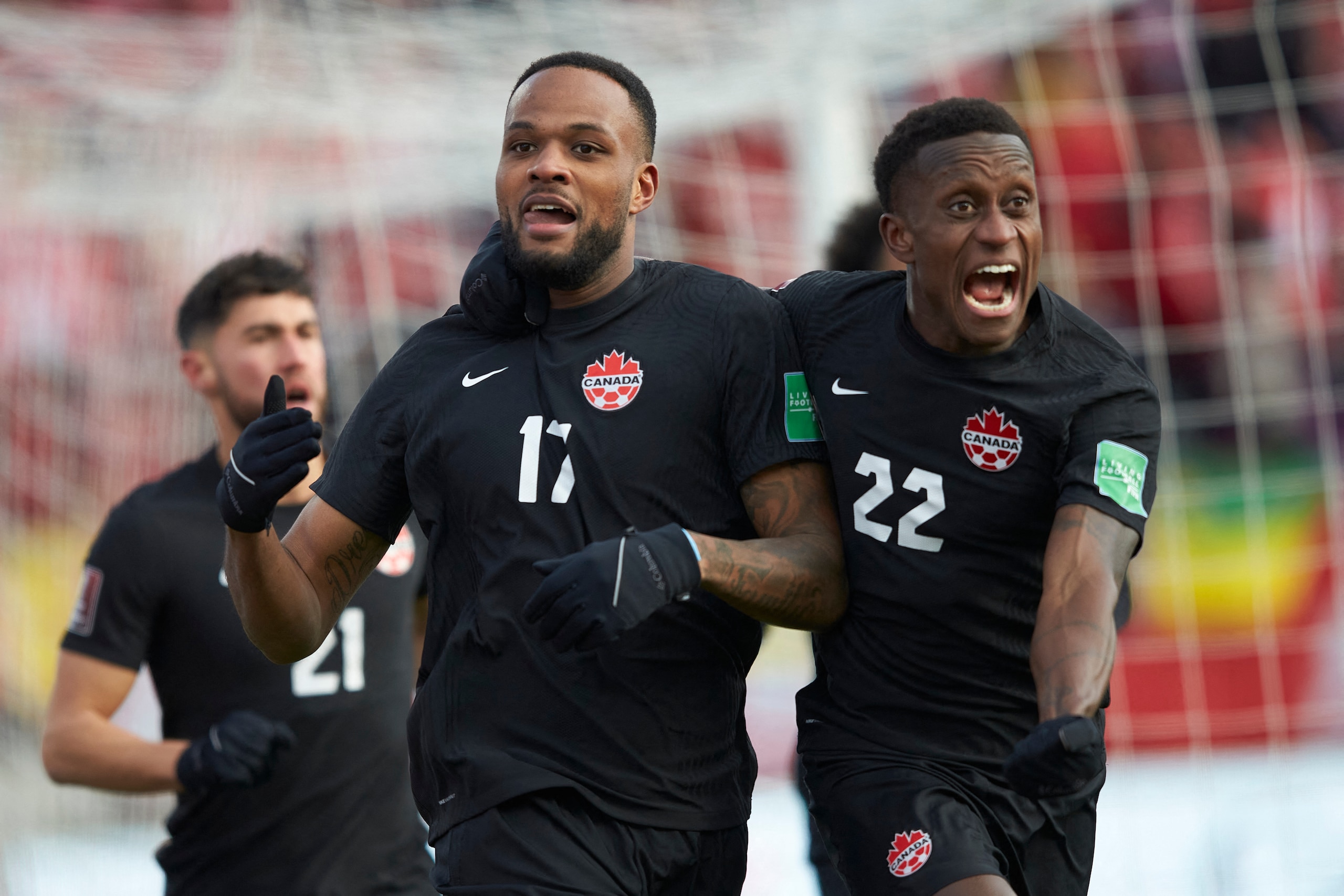 Canadas Cyle Larin (L), celebrates his first half goal with Richie Lareya during the World Cup qualifying match between Canada and the United States in Hamilton, Ontario, on January 30, 2022. (Photo by Geoff Robins / AFP) (Photo by GEOFF ROBINS/AFP via Getty Images) Canadas Cyle Larin (L), celebrates his first half goal with Richie Lareya during the World Cup qualifying match between Canada and the United States in Hamilton, Ontario, on January 30, 2022. (Photo by Geoff Robins / AFP) (Photo by GEOFF ROBINS/AFP via Getty Images)