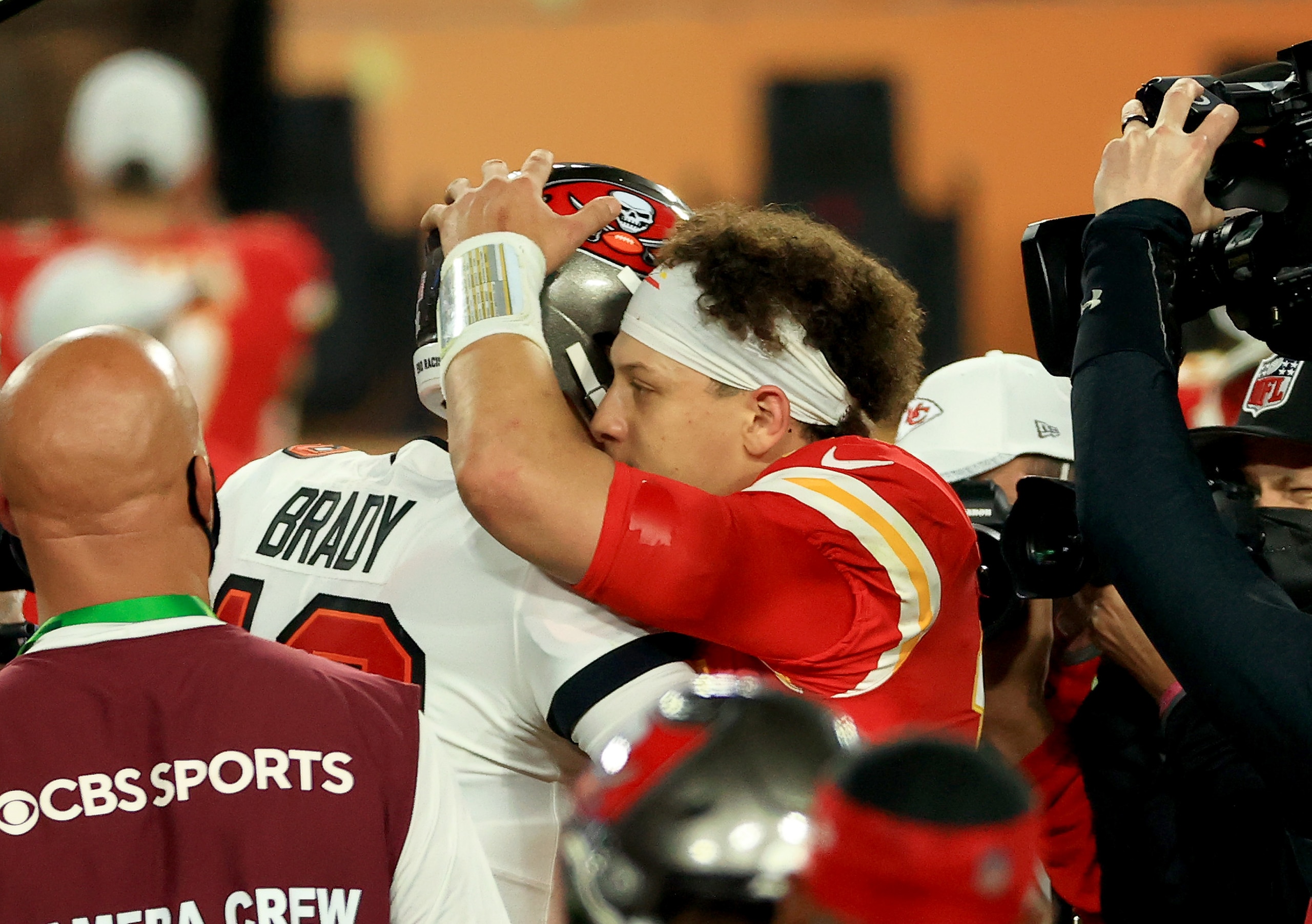 TAMPA, FLORIDA - FEBRUARY 07: Tom Brady #12 of the Tampa Bay Buccaneers and Patrick Mahomes #15 of the Kansas City Chiefs speak after Super Bowl LV at Raymond James Stadium on February 07, 2021 in Tampa, Florida. The Buccaneers defeated the Chiefs 31-9.
(Photo by Mike Ehrmann/Getty Images) TAMPA, FLORIDA - FEBRUARY 07: Tom Brady #12 of the Tampa Bay Buccaneers and Patrick Mahomes #15 of the Kansas City Chiefs speak after Super Bowl LV at Raymond James Stadium on February 07, 2021 in Tampa, Florida. The Buccaneers defeated the Chiefs 31-9.
(Photo by Mike Ehrmann/Getty Images)