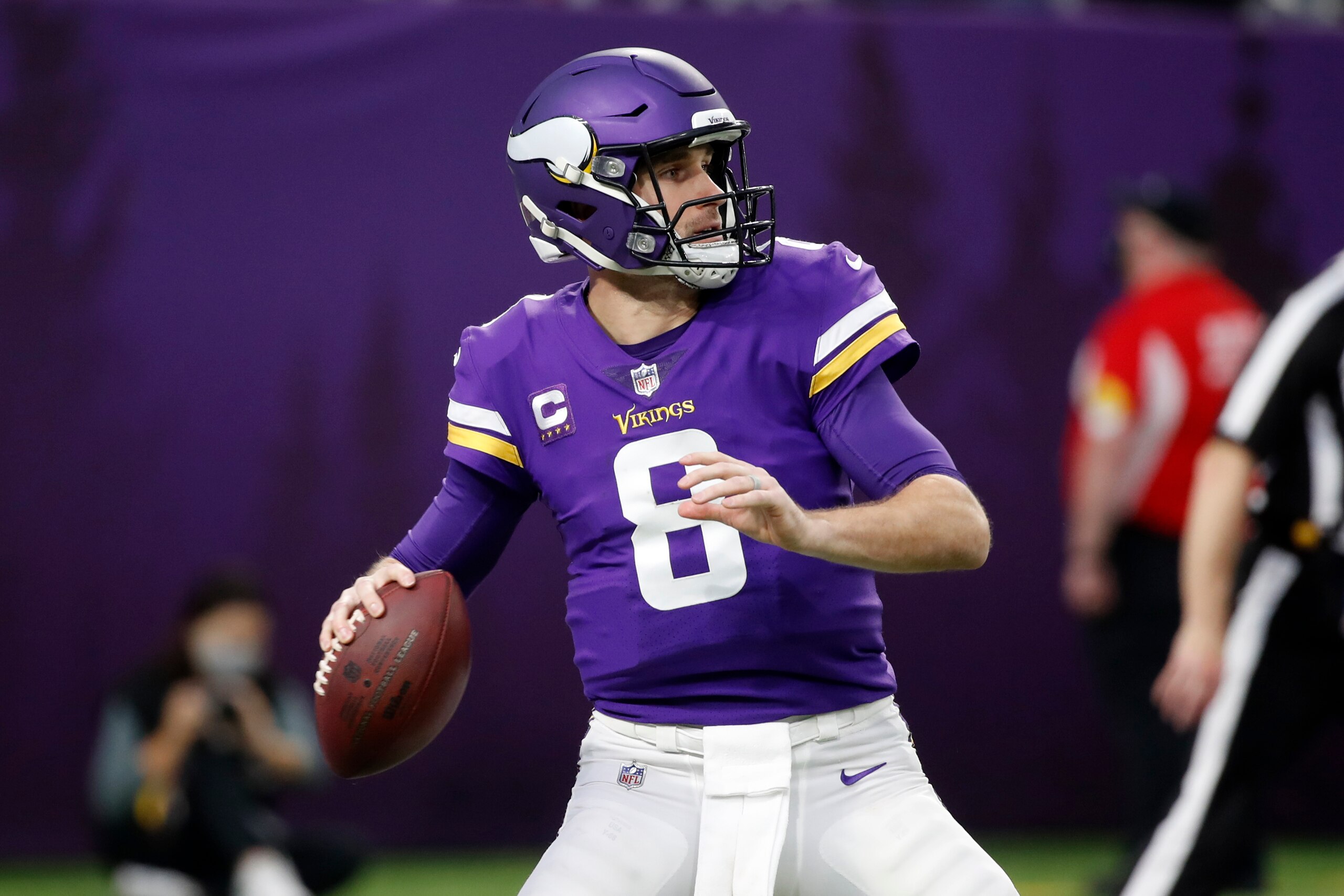 Minnesota Vikings quarterback Kirk Cousins (8) looks to pass during the second half of an NFL football game against the Los Angeles Rams, Sunday, Dec. 26, 2021, in Minneapolis. (AP Photo/Bruce Kluckhohn) Minnesota Vikings quarterback Kirk Cousins (8) looks to pass during the second half of an NFL football game against the Los Angeles Rams, Sunday, Dec. 26, 2021, in Minneapolis. (AP Photo/Bruce Kluckhohn)