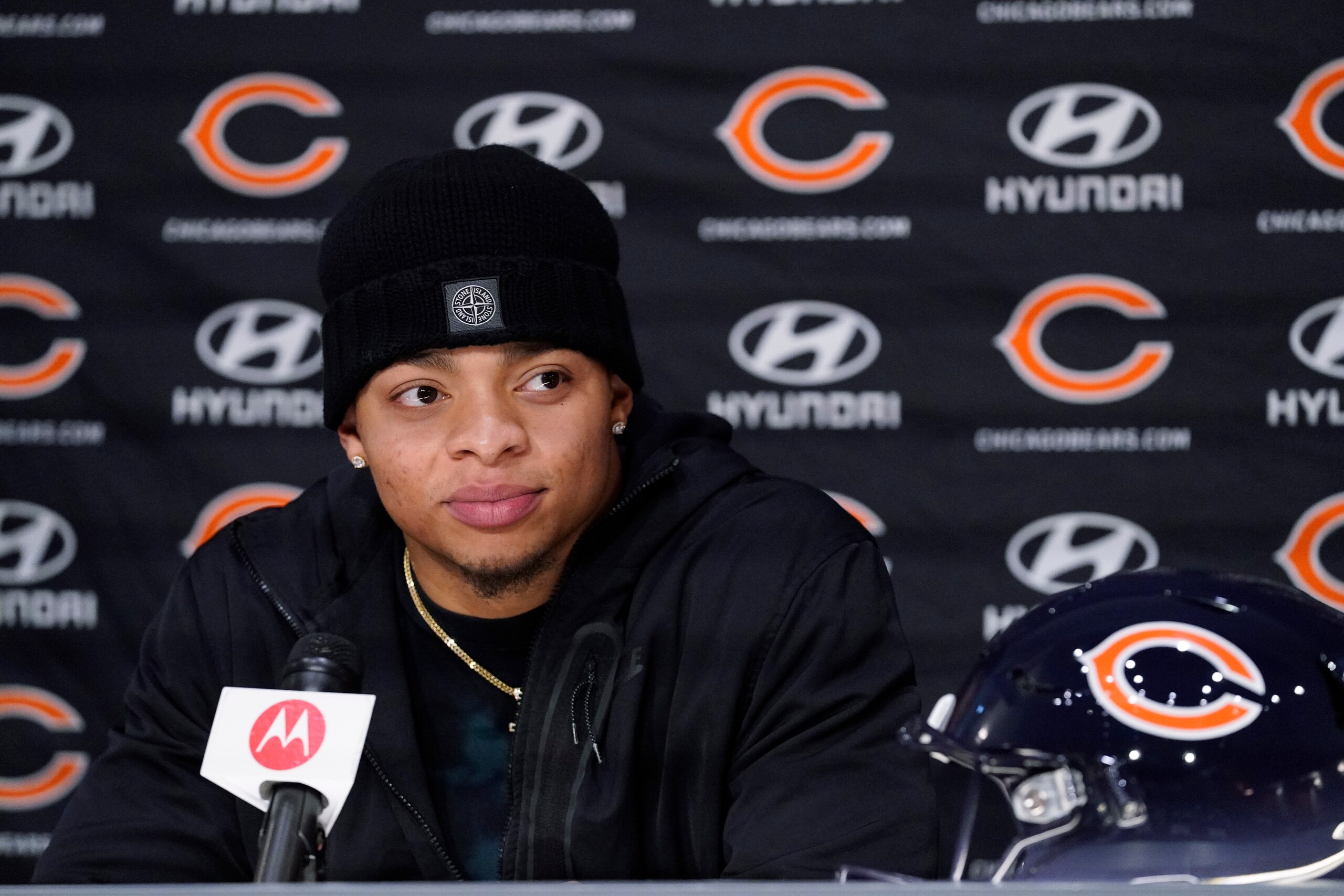 Chicago Bears NFL football team quarterback Justin Fields listens to a question during a news conference at Halas Hall in Lake Forest, Ill., Monday, Jan. 31, 2022. (AP Photo/Nam Y. Huh)