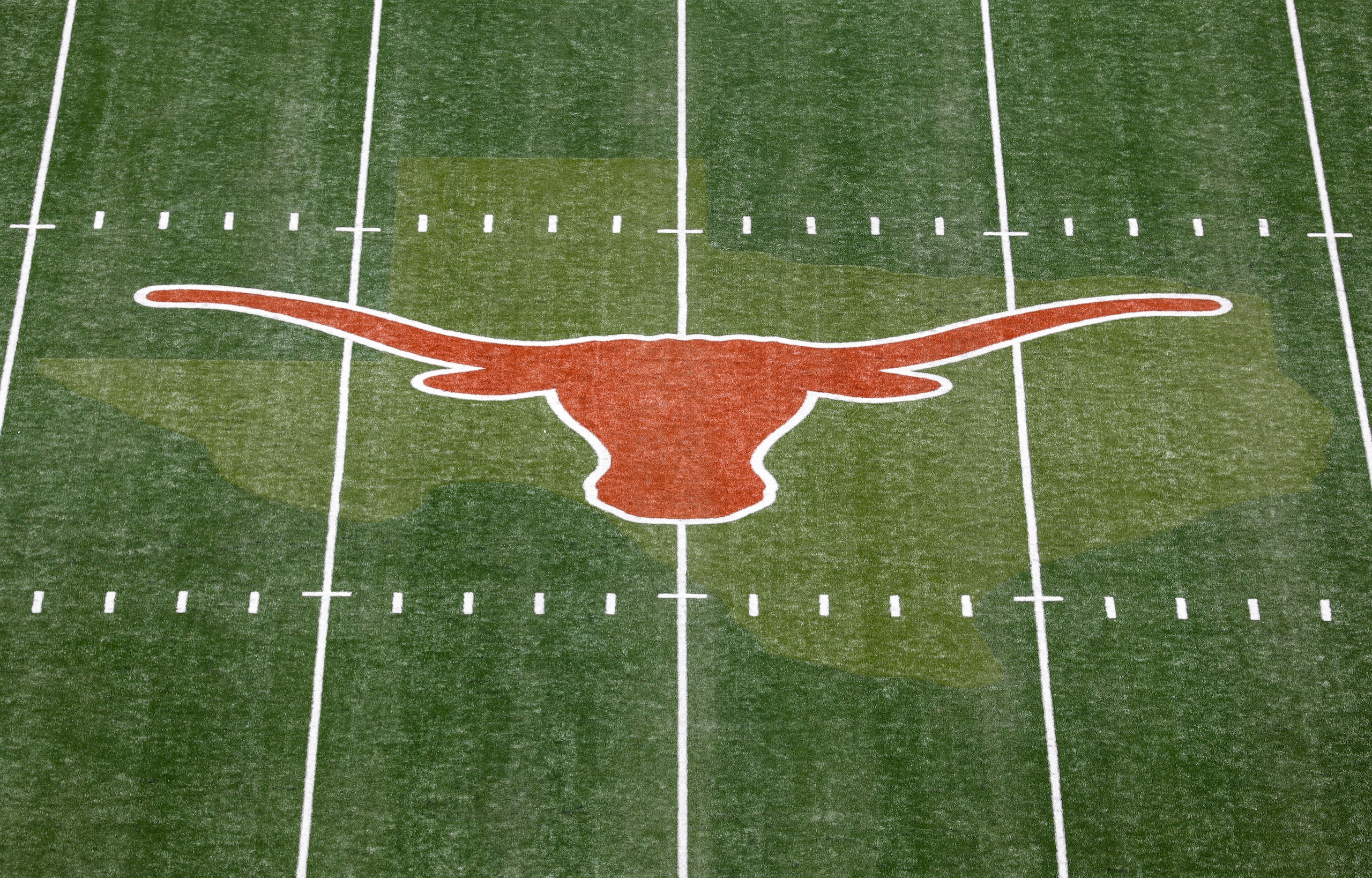 AUSTIN, TEXAS - SEPTEMBER 04: A view of the Texas Longhorns logo at midfield before the game between the Texas Longhorns and the Louisiana Ragin' Cajuns at Darrell K Royal-Texas Memorial Stadium on September 04, 2021 in Austin, Texas. (Photo by Tim Warner/Getty Images)