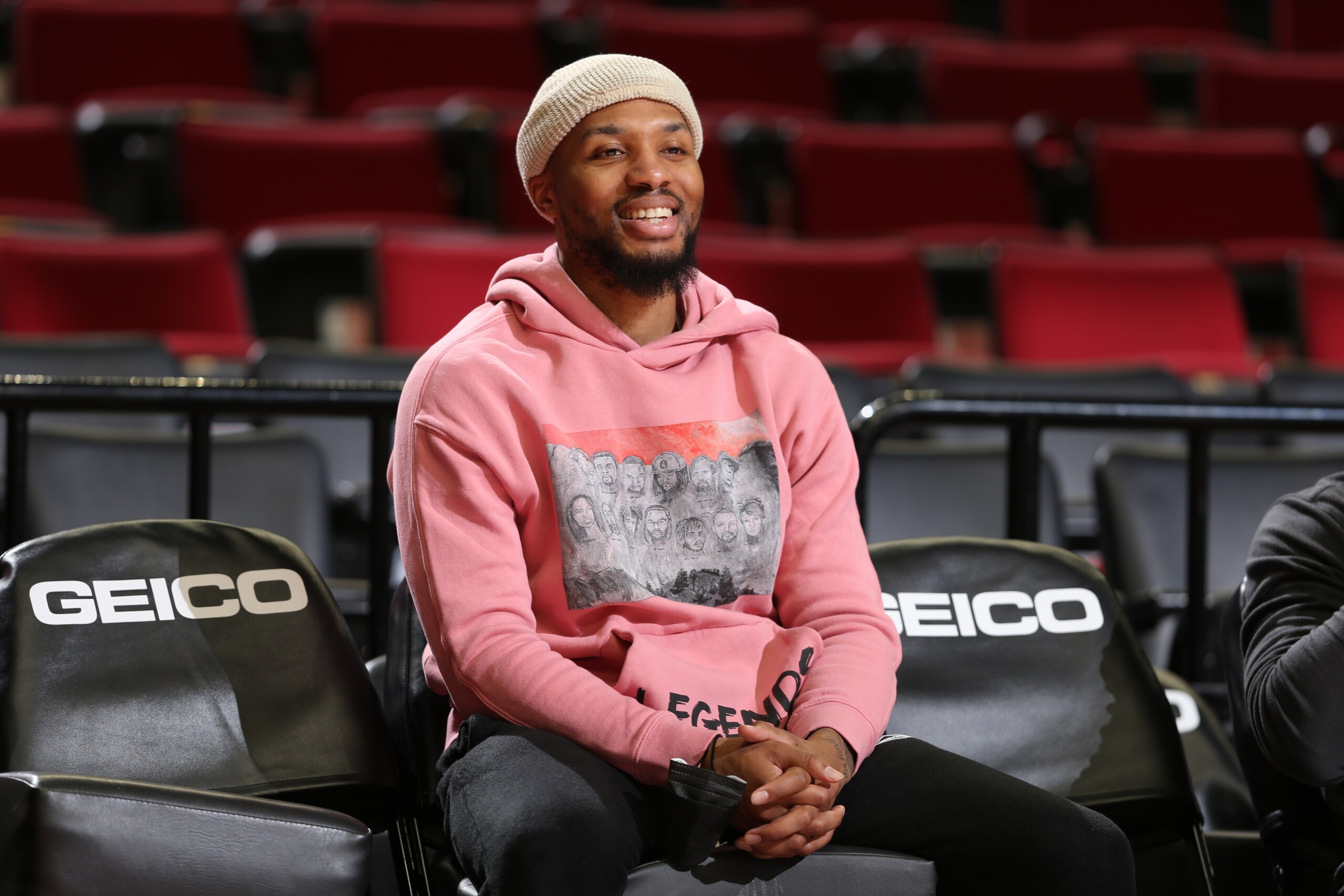 PORTLAND, OR - JANUARY 5: Damian Lillard #0 of the Portland Trail Blazers looks on before the game against the Miami Heat on January 5, 2022 at the Moda Center Arena in Portland, Oregon. NOTE TO USER: User expressly acknowledges and agrees that, by downloading and or using this photograph, user is consenting to the terms and conditions of the Getty Images License Agreement. Mandatory Copyright Notice: Copyright 2022 NBAE (Photo by Sam Forencich/NBAE via Getty Images)