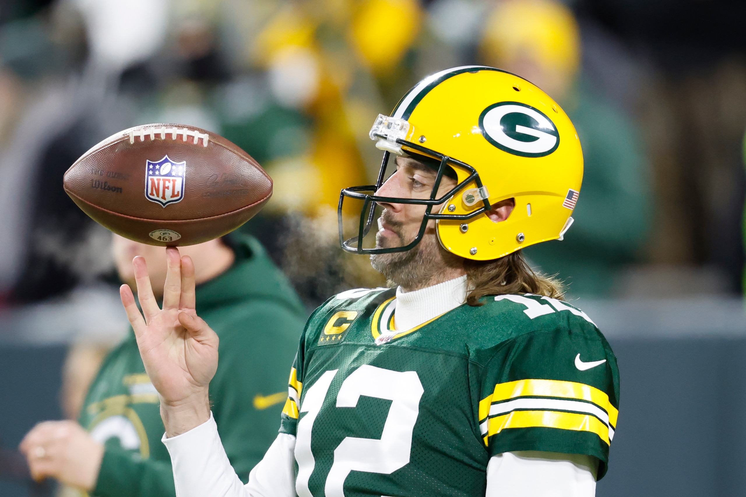 Green Bay Packers quarterback Aaron Rodgers (12) warms up before an NFL divisional playoff football game against the San Francisco 49ers, Saturday, Jan 22. 2022, in Green Bay, Wis. (AP Photo/Jeffrey Phelps)