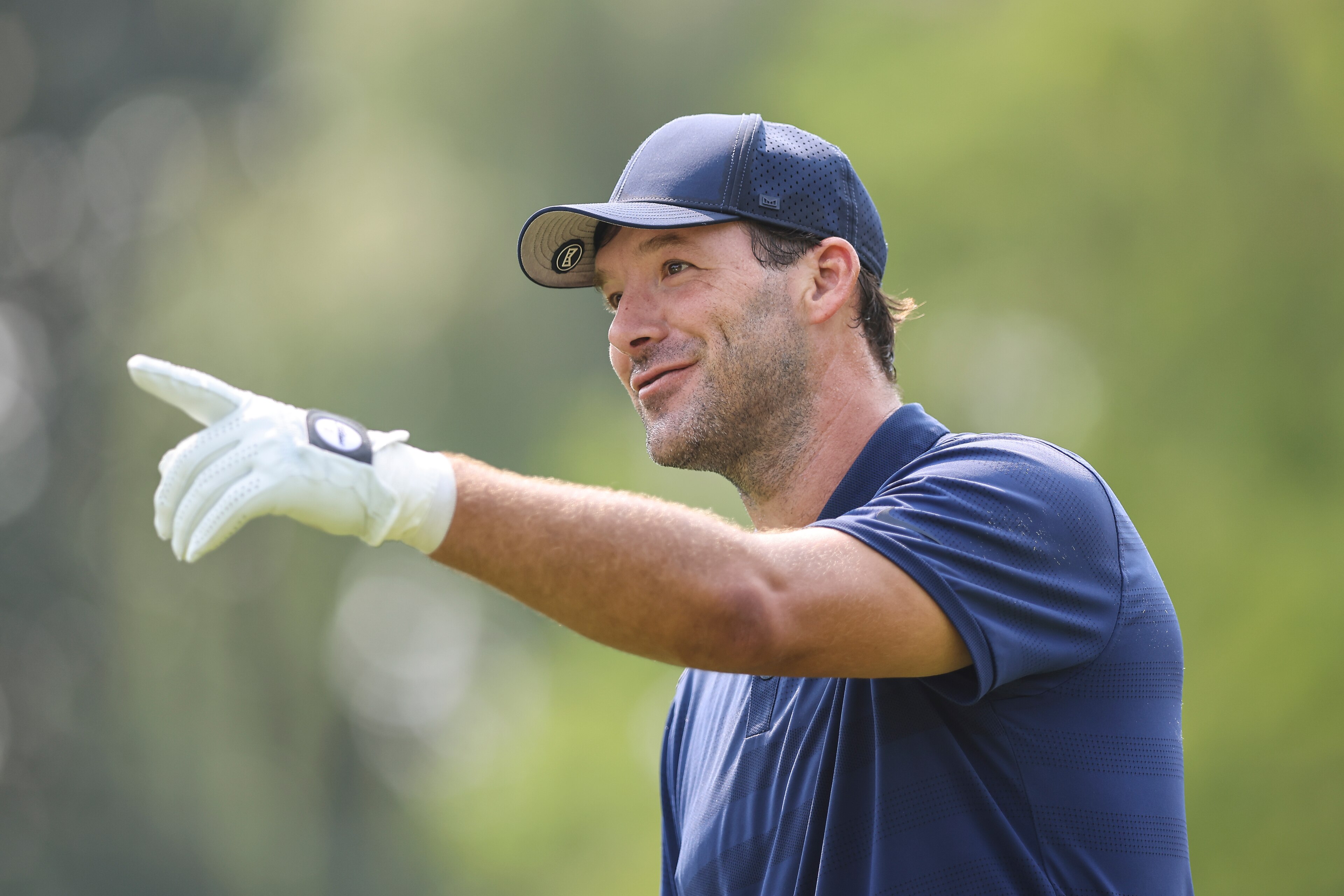 SPRINGFIELD, MO - JULY 22: Tony Romo, former NFL quarterback, looks on from the 17th tee during the first round of the Price Cutter Charity Championship presented by Dr. Pepper at Highland Spring Country Club on July 22, 2021 in Springfield, Missouri. (Photo by James Gilbert/PGA TOUR)