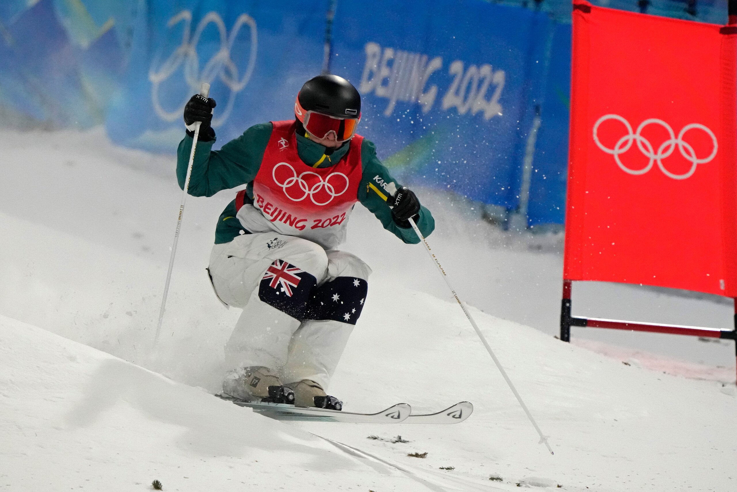 Australia's Jakara Anthony competes in the women's moguls finals at Genting Snow Park at the 2022 Winter Olympics, Sunday, Feb. 6, 2022, in Zhangjiakou, China. (AP Photo/Lee Jin-man)