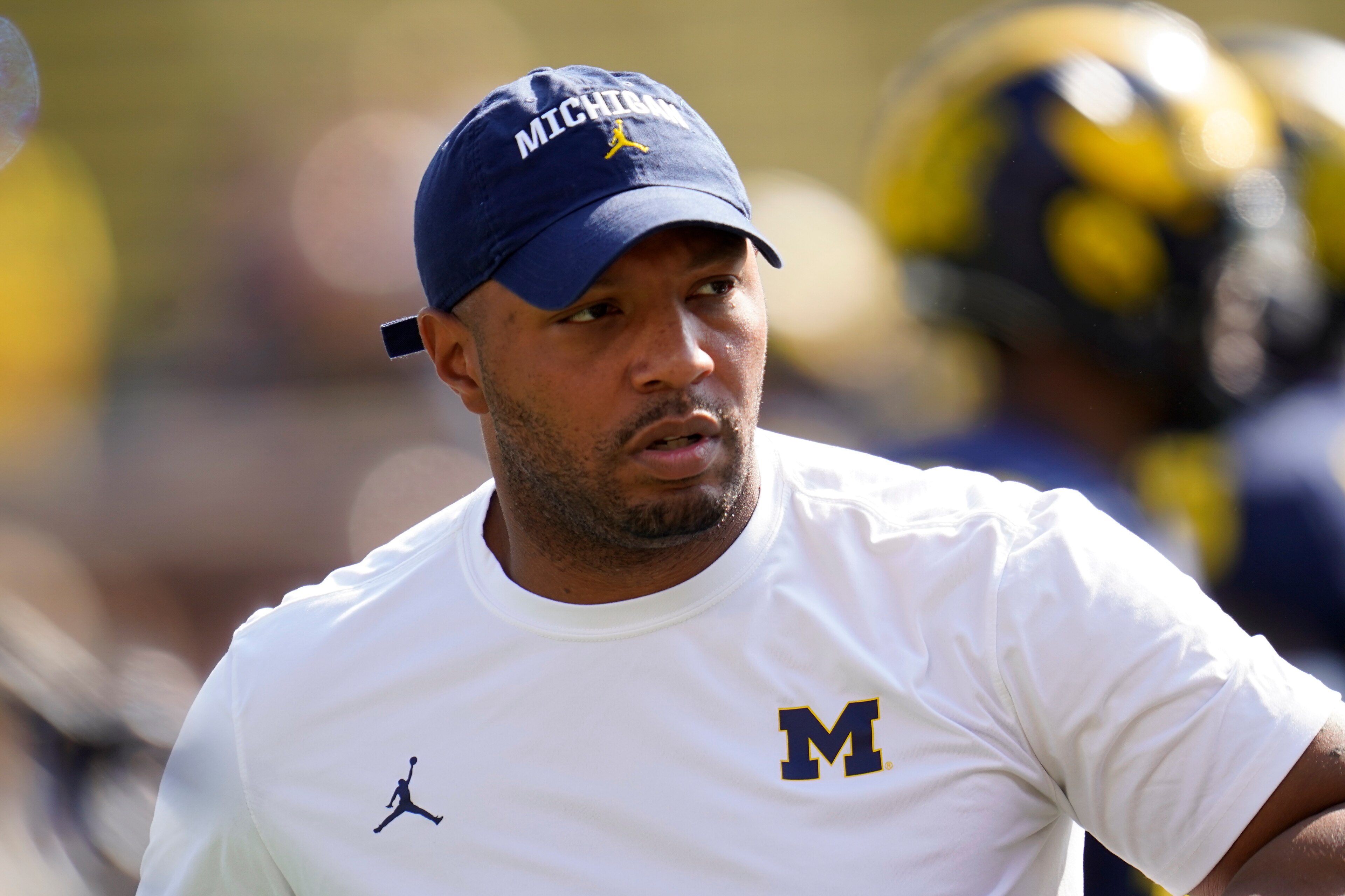 Michigan offensive coordinator Josh Gattis watches against Northern Illinois in the first half of a NCAA college football game in Ann Arbor, Mich., Saturday, Sept. 18, 2021. (AP Photo/Paul Sancya)