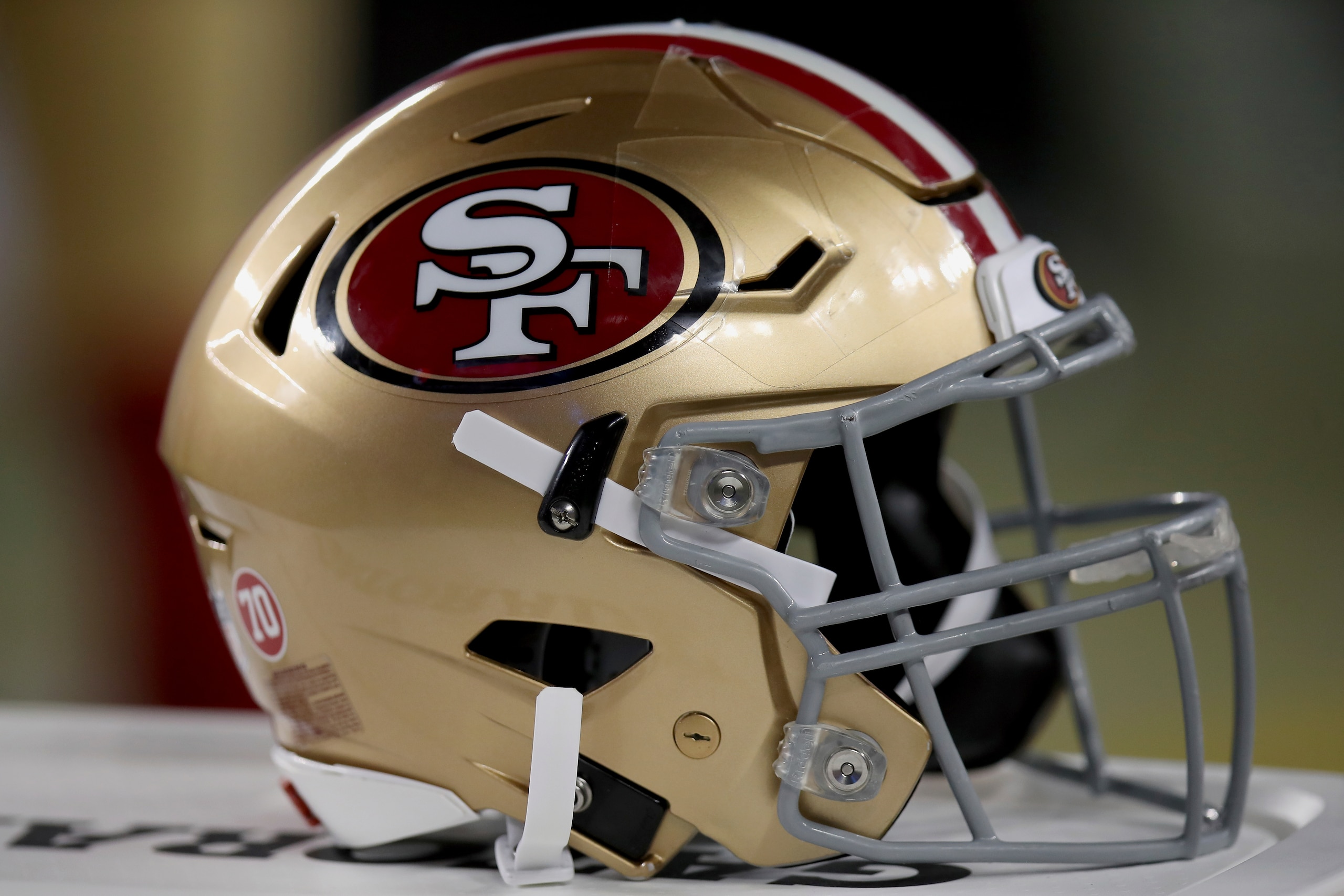 A San Francisco 49ers helmet sits on the sideline during an NFL football game against the Kansas City Chiefs, Saturday, Aug. 14, 2021, in Santa Clara, Calif. (AP Photo/Scot Tucker)