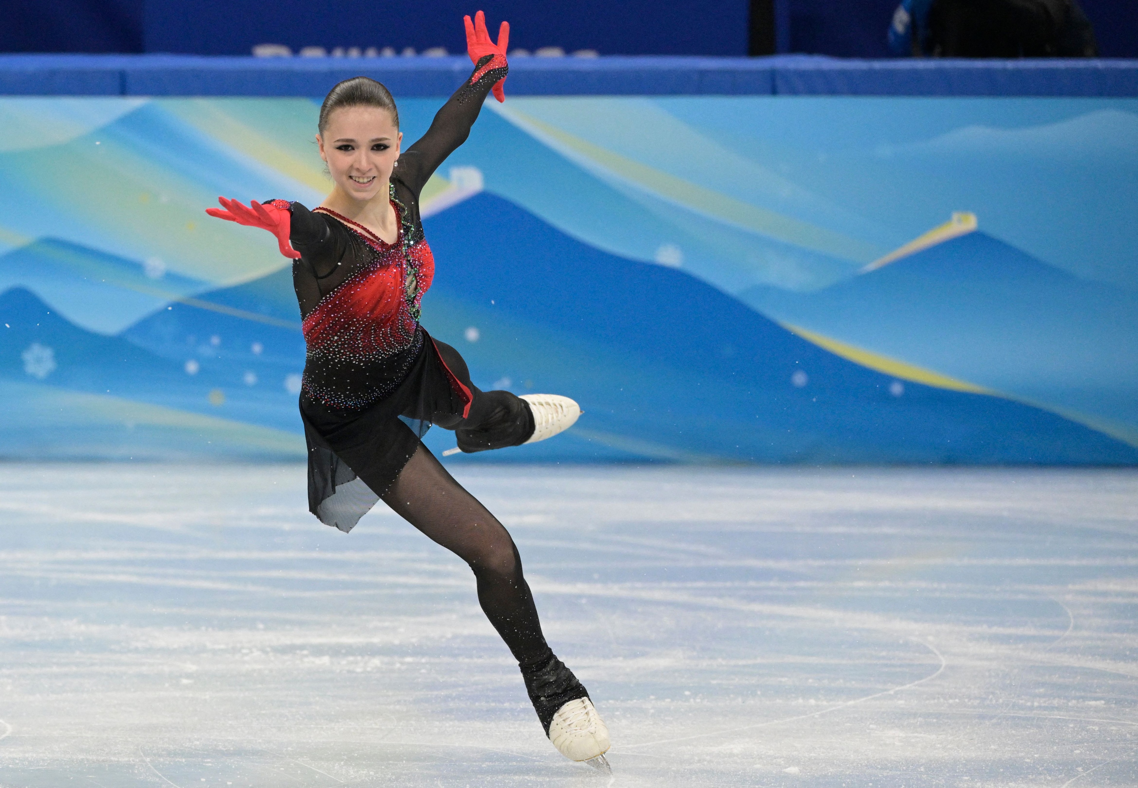 Russia's Kamila Valieva competes in the women's single skating free skating of the figure skating team event during the Beijing 2022 Winter Olympic Games at the Capital Indoor Stadium in Beijing on February 7, 2022. (Photo by SEBASTIEN BOZON / AFP) (Photo by SEBASTIEN BOZON/AFP via Getty Images)