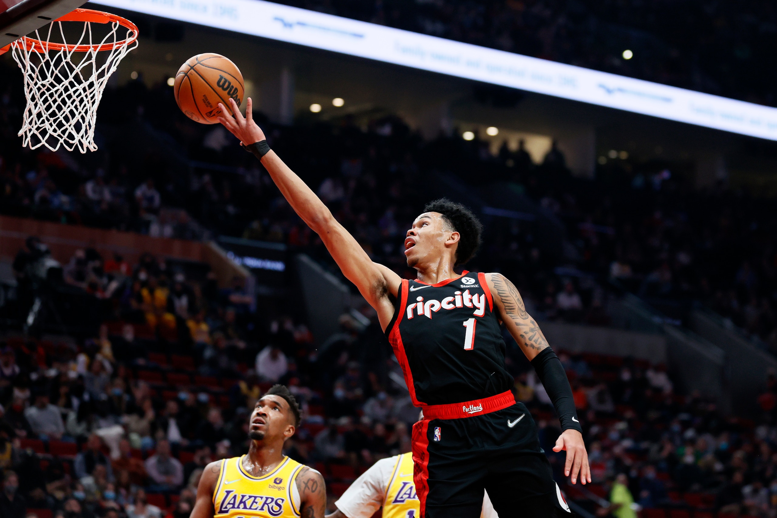 PORTLAND, OREGON - FEBRUARY 09: Anfernee Simons #1 of the Portland Trail Blazers shoots against the Los Angeles Lakers during the first quarter at Moda Center on February 09, 2022 in Portland, Oregon. NOTE TO USER: User expressly acknowledges and agrees that, by downloading and/or using this photograph, User is consenting to the terms and conditions of the Getty Images License Agreement. (Photo by Steph Chambers/Getty Images)