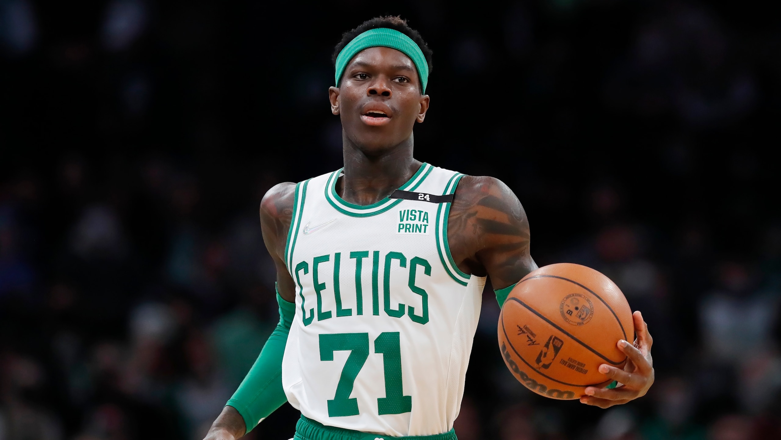 Boston Celtics' Dennis Schroder plays against the Portland Trail Blazers during the first half of an NBA basketball game, Friday, Jan. 21, 2022, in Boston. (AP Photo/Michael Dwyer)