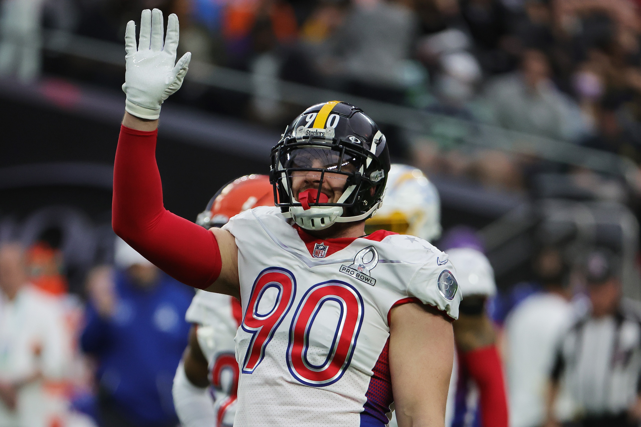 LAS VEGAS, NEVADA - FEBRUARY 06: T.J. Watt #90 of the Pittsburgh Steelers and AFC waves during the second half of the 2022 NFL Pro Bowl against the NFC at Allegiant Stadium on February 06, 2022 in Las Vegas, Nevada.  (Photo by Ethan Miller/Getty Images)