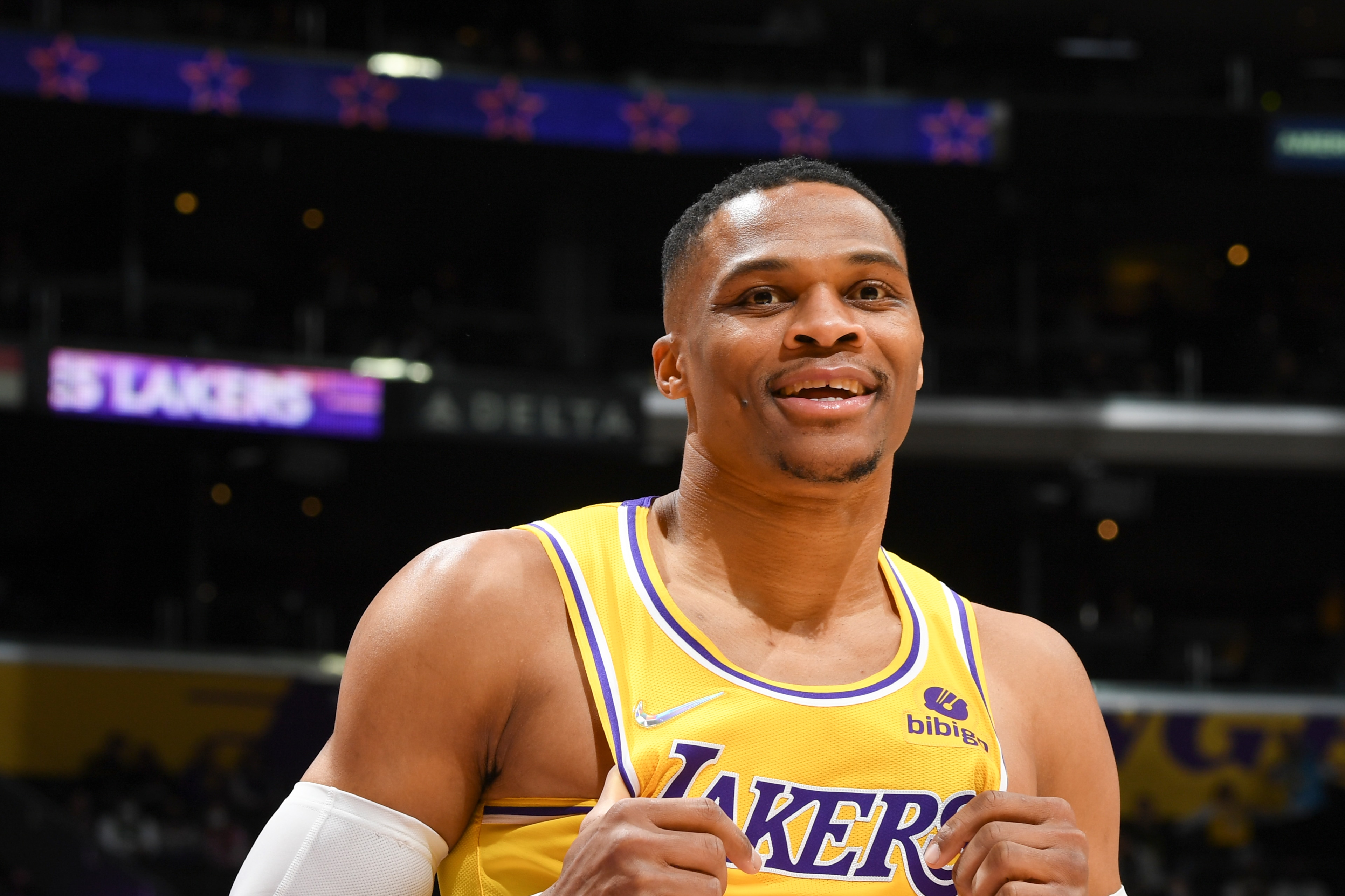LOS ANGELES, CA - FEBRUARY 8: Russell Westbrook #0 of the Los Angeles Lakers smiles during the game against the Milwaukee Bucks on February 8, 2022 at Crypto.Com Arena in Los Angeles, California. NOTE TO USER: User expressly acknowledges and agrees that, by downloading and/or using this Photograph, user is consenting to the terms and conditions of the Getty Images License Agreement. Mandatory Copyright Notice: Copyright 2022 NBAE (Photo by Andrew D. Bernstein/NBAE via Getty Images) LOS ANGELES, CA - FEBRUARY 8: Russell Westbrook #0 of the Los Angeles Lakers smiles during the game against the Milwaukee Bucks on February 8, 2022 at Crypto.Com Arena in Los Angeles, California. NOTE TO USER: User expressly acknowledges and agrees that, by downloading and/or using this Photograph, user is consenting to the terms and conditions of the Getty Images License Agreement. Mandatory Copyright Notice: Copyright 2022 NBAE (Photo by Andrew D. Bernstein/NBAE via Getty Images)