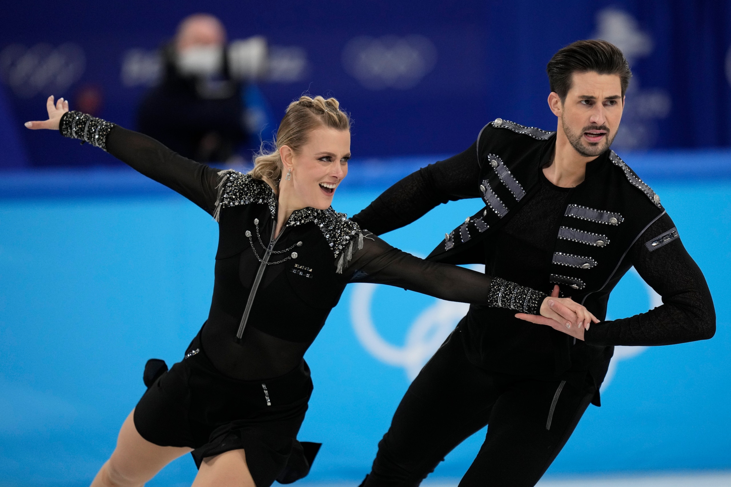Madison Hubbell and Zachary Donohue, of the United States, compete during the ice dance team program in the figure skating competition at the 2022 Winter Olympics, Friday, Feb. 4, 2022, in Beijing. (AP Photo/Bernat Armangue)