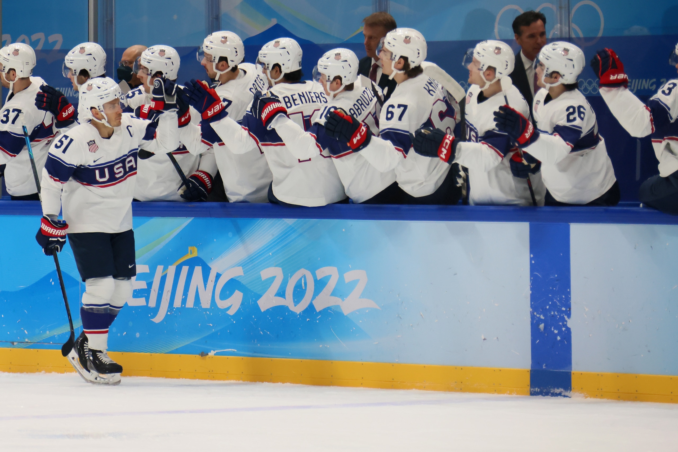 BEIJING, CHINA - FEBRUARY 12: Andy Miele #51 of Team United States celebrates with teammates on the bench after scoring in the first period during the Men's Ice Hockey Preliminary Round Group A match between Team Canada and Team United States on Day 8 of the Beijing 2022 Winter Olympic Games at National Indoor Stadium on February 12, 2022 in Beijing, China. (Photo by Bruce Bennett/Getty Images) BEIJING, CHINA - FEBRUARY 12: Andy Miele #51 of Team United States celebrates with teammates on the bench after scoring in the first period during the Men's Ice Hockey Preliminary Round Group A match between Team Canada and Team United States on Day 8 of the Beijing 2022 Winter Olympic Games at National Indoor Stadium on February 12, 2022 in Beijing, China. (Photo by Bruce Bennett/Getty Images)