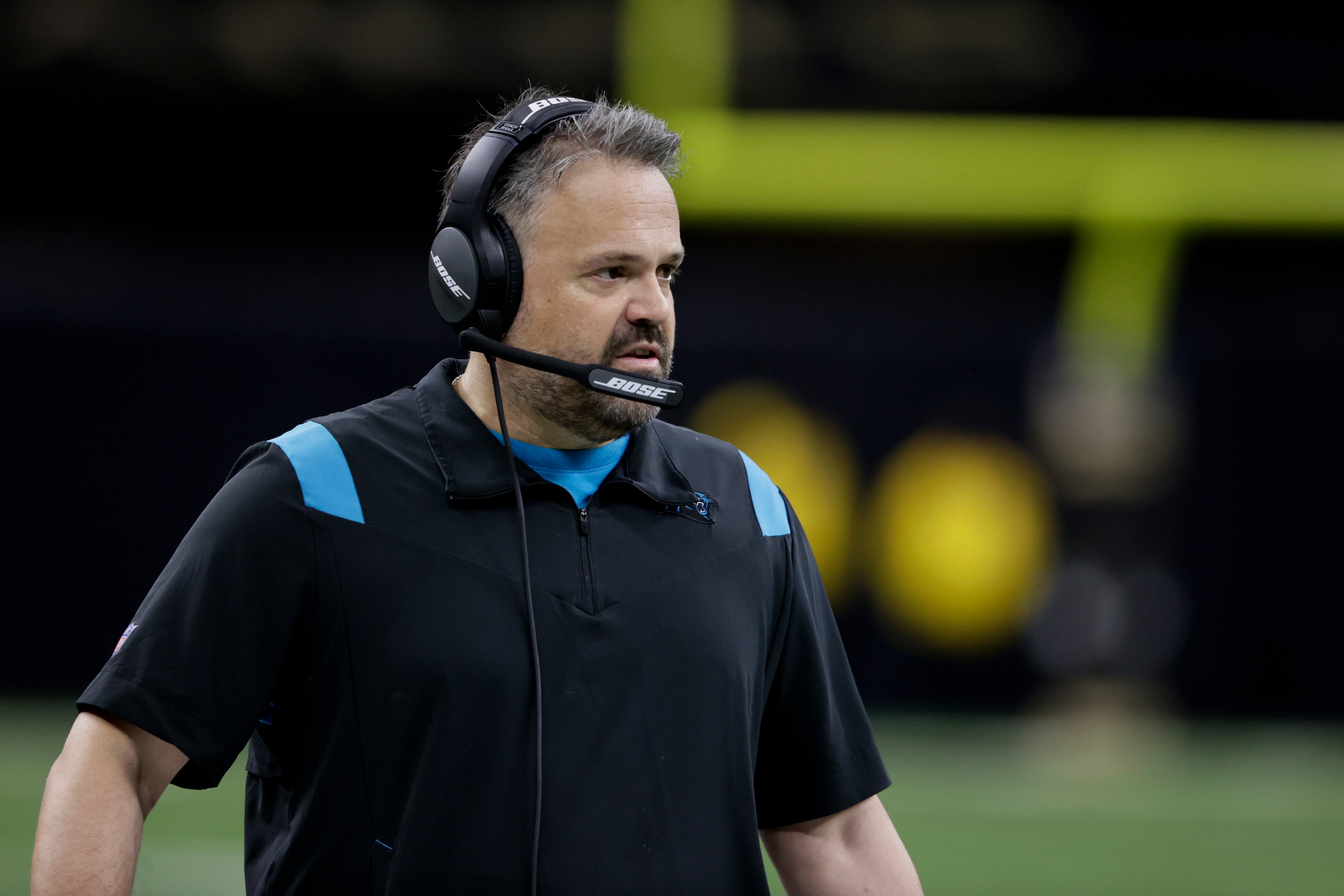 Carolina Panthers head coach Matt Rhule talks on the sideline in the second half of an NFL football game against the New Orleans Saints in New Orleans, Sunday, Jan. 2, 2022. (AP Photo/Butch Dill)