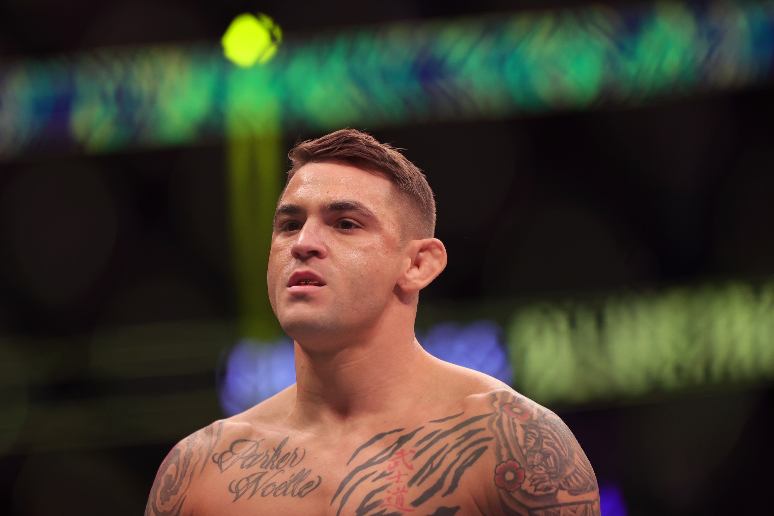 LAS VEGAS, NEVADA - DECEMBER 11: Dustin Poirier looks on before his lightweight title fight against Charles Oliveira of Brazil during the UFC 269 event at T-Mobile Arena on December 11, 2021 in Las Vegas, Nevada. (Photo by Carmen Mandato/Getty Images)