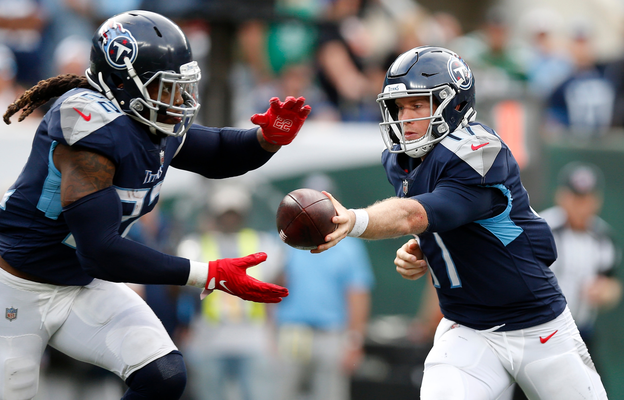 EAST RUTHERFORD, NEW JERSEY - OCTOBER 03: (NEW YORK DAILIES OUT)  Ryan Tannehill #17 and Derrick Henry #22 of the Tennessee Titans in action against the at MetLife Stadium on October 03, 2021 in East Rutherford, New Jersey. The Jets defeated the Titans 27-24 in overtime. (Photo by Jim McIsaac/Getty Images)