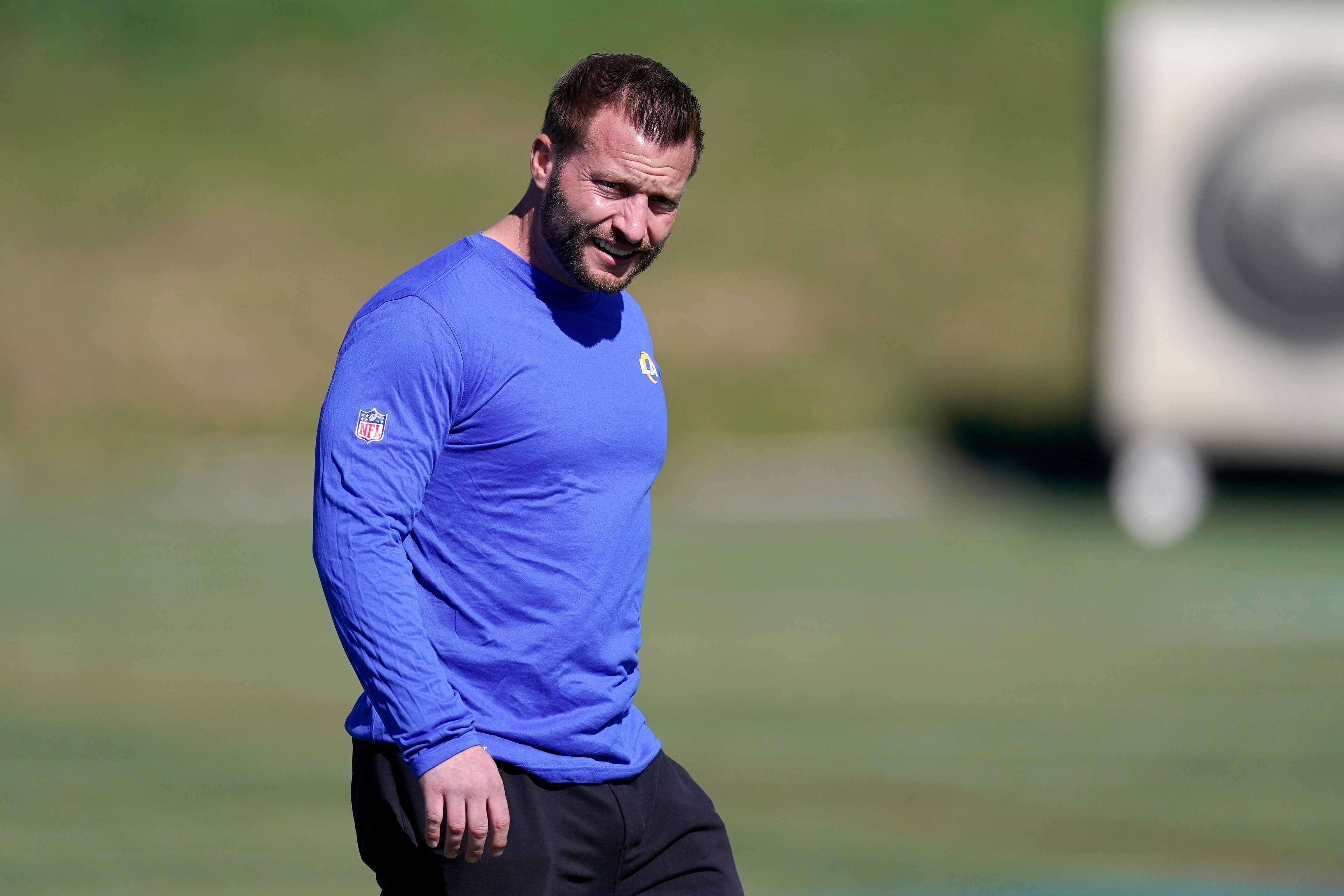 Los Angeles Rams head coach Sean McVay walks out to the field during practice for an NFL Super Bowl football game Friday, Feb. 11, 2022, in Thousand Oaks, Calif. The Rams are scheduled to play the Cincinnati Bengals in the Super Bowl on Sunday. (AP Photo/Mark J. Terrill)