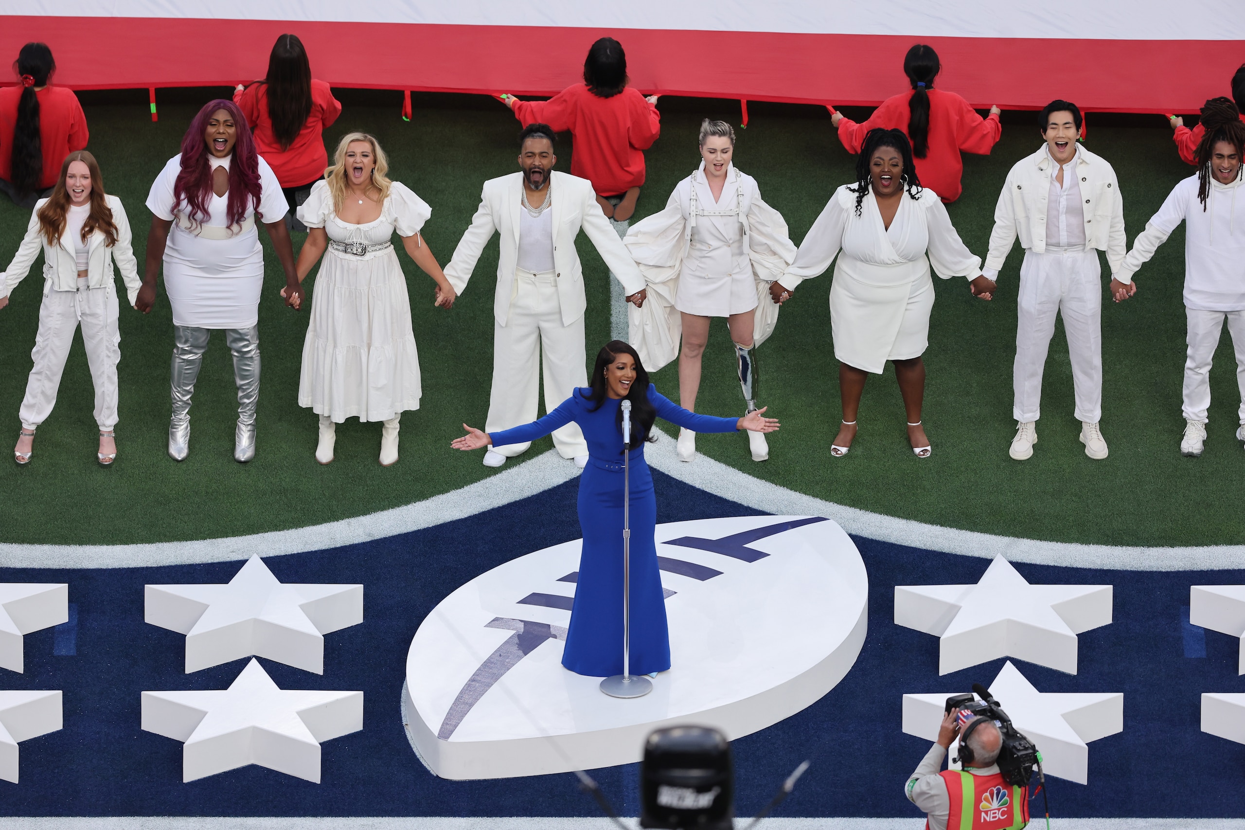 INGLEWOOD, CALIFORNIA - FEBRUARY 13: Singer Mickey Guyton performs the national anthem before Super Bowl LVI between the Cincinnati Bengals and the Los Angeles Rams at SoFi Stadium on February 13, 2022 in Inglewood, California. (Photo by Gregory Shamus/Getty Images)