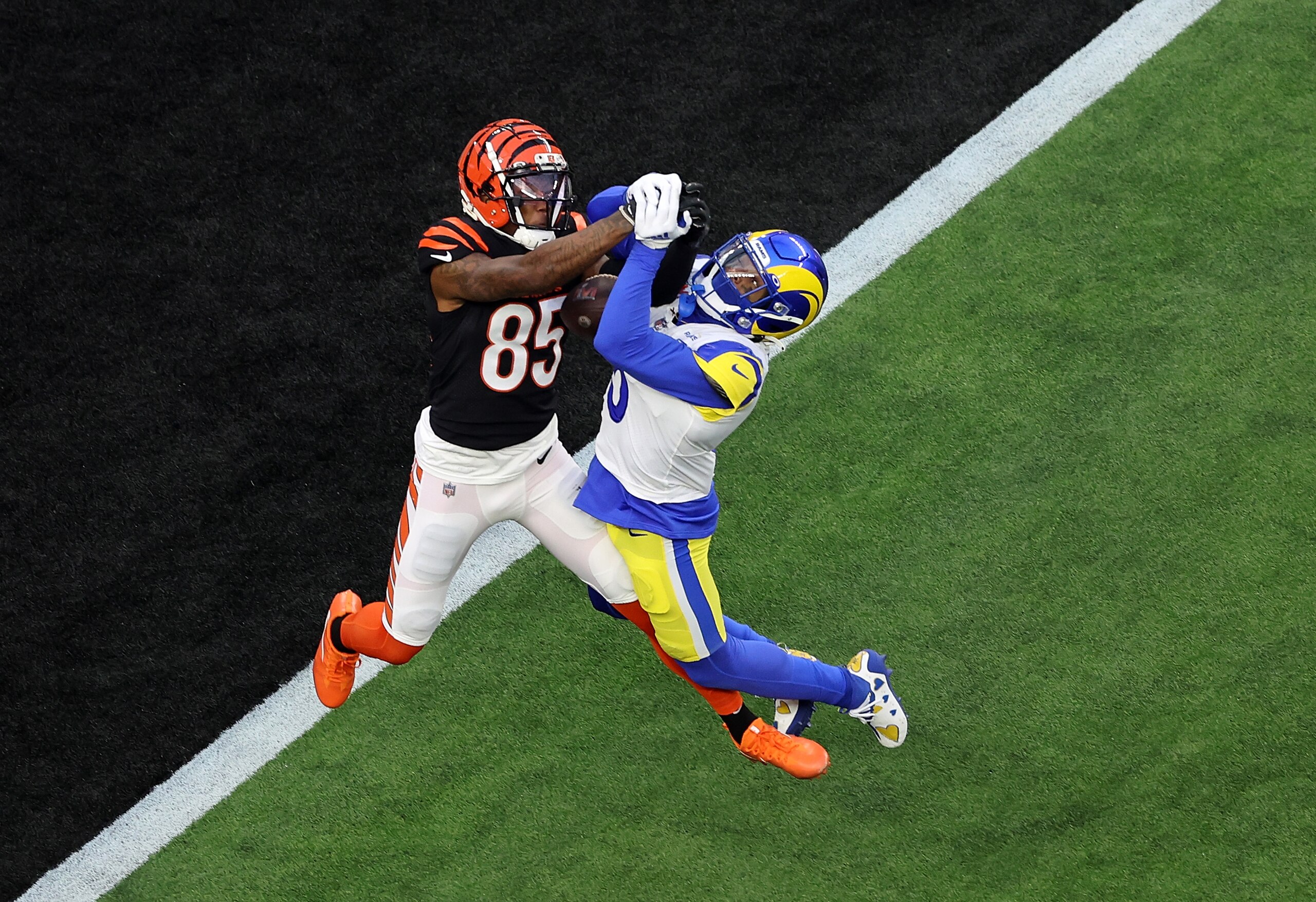 INGLEWOOD, CALIFORNIA - FEBRUARY 13: Tee Higgins #85 of the Cincinnati Bengals has a pass broken up by Jalen Ramsey #5 of the Los Angeles Rams during Super Bowl LVI at SoFi Stadium on February 13, 2022 in Inglewood, California. (Photo by Gregory Shamus/Getty Images)
