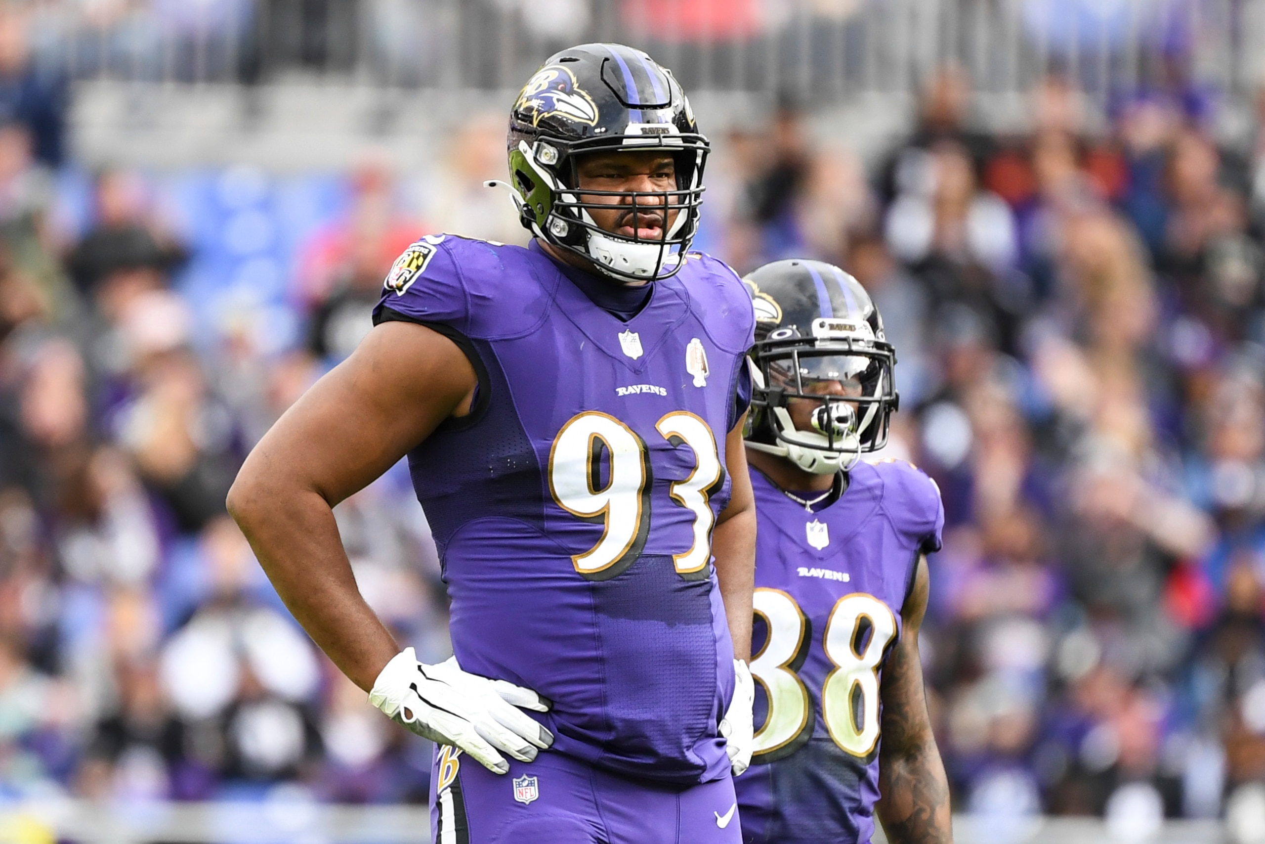 Baltimore Ravens defensive end Calais Campbell (93) looks on between plays during the first half of an NFL football game against the Los Angeles Rams, Sunday, Jan. 2, 2022, in Baltimore. (AP Photo/Terrance Williams)