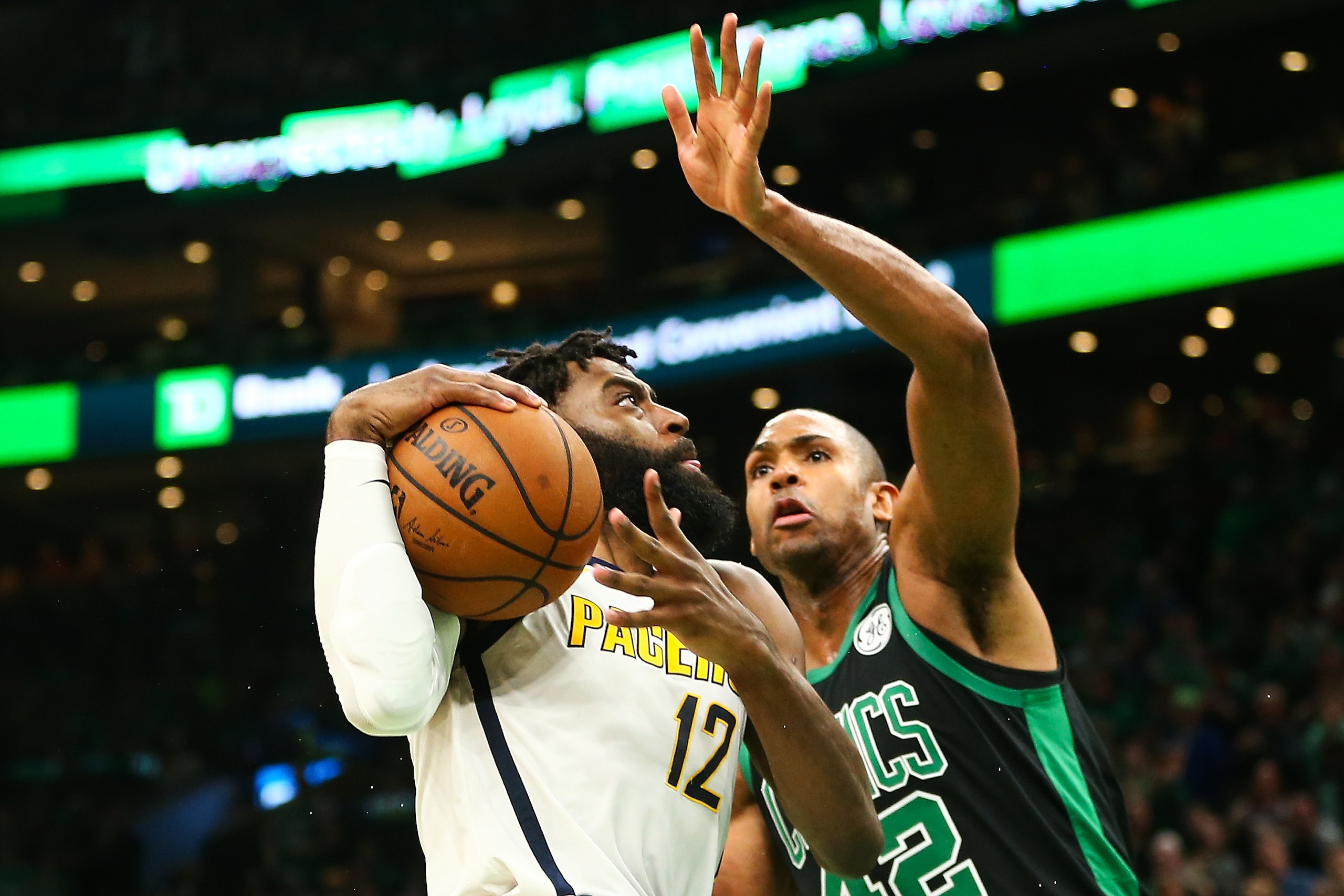 BOSTON, MA - APRIL 14: Tyreke Evans #12 of the Indiana Pacers rives to the basket while guarded by Al Horford #42 of the Boston Celtics during Game One of the first round of the 2019 NBA Eastern Conference Playoffs at TD Garden on April 14, 2019 in Boston, Massachusetts. NOTE TO USER: User expressly acknowledges and agrees that, by downloading and or using this photograph, User is consenting to the terms and conditions of the Getty Images License Agreement. (Photo by Adam Glanzman/Getty Images) BOSTON, MA - APRIL 14: Tyreke Evans #12 of the Indiana Pacers rives to the basket while guarded by Al Horford #42 of the Boston Celtics during Game One of the first round of the 2019 NBA Eastern Conference Playoffs at TD Garden on April 14, 2019 in Boston, Massachusetts. NOTE TO USER: User expressly acknowledges and agrees that, by downloading and or using this photograph, User is consenting to the terms and conditions of the Getty Images License Agreement. (Photo by Adam Glanzman/Getty Images)