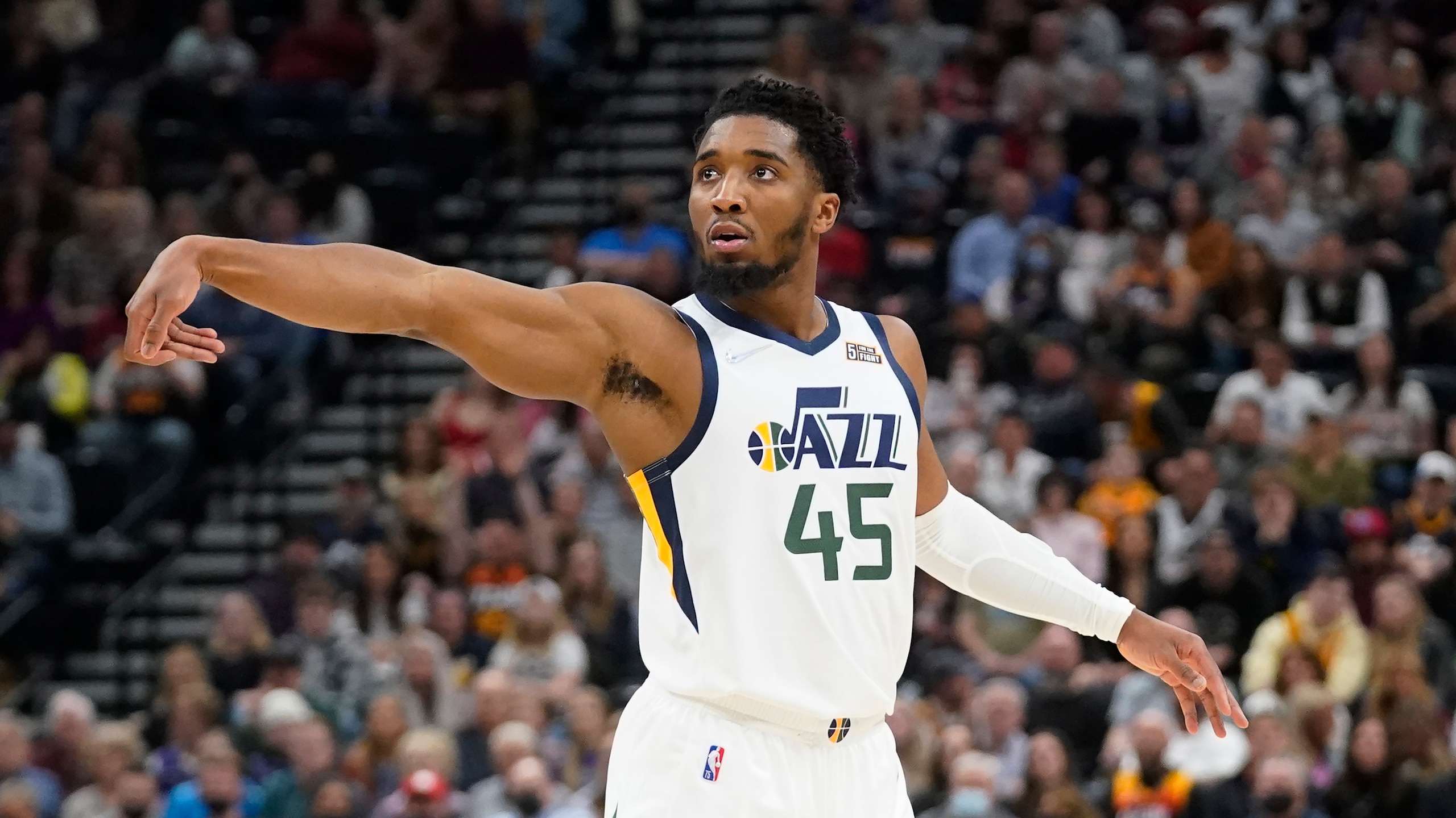 Utah Jazz guard Donovan Mitchell (45) shoots a 3-pointer against the Houston Rockets in the second half during an NBA basketball game Monday, Feb. 14, 2022, in Salt Lake City. (AP Photo/Rick Bowmer) Utah Jazz guard Donovan Mitchell (45) shoots a 3-pointer against the Houston Rockets in the second half during an NBA basketball game Monday, Feb. 14, 2022, in Salt Lake City. (AP Photo/Rick Bowmer)