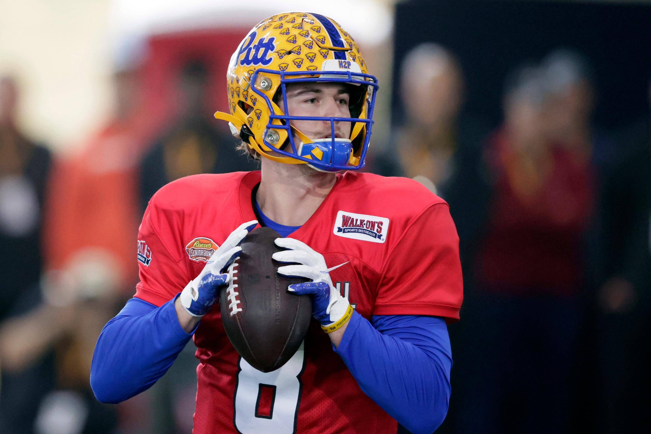 National Team quarterback Kenny Pickett of Pittsburgh (8) runs through drills during practice for the Senior Bowl NCAA college football game Thursday, Feb. 3, 2022, in Mobile, Ala. (AP Photo/Butch Dill)