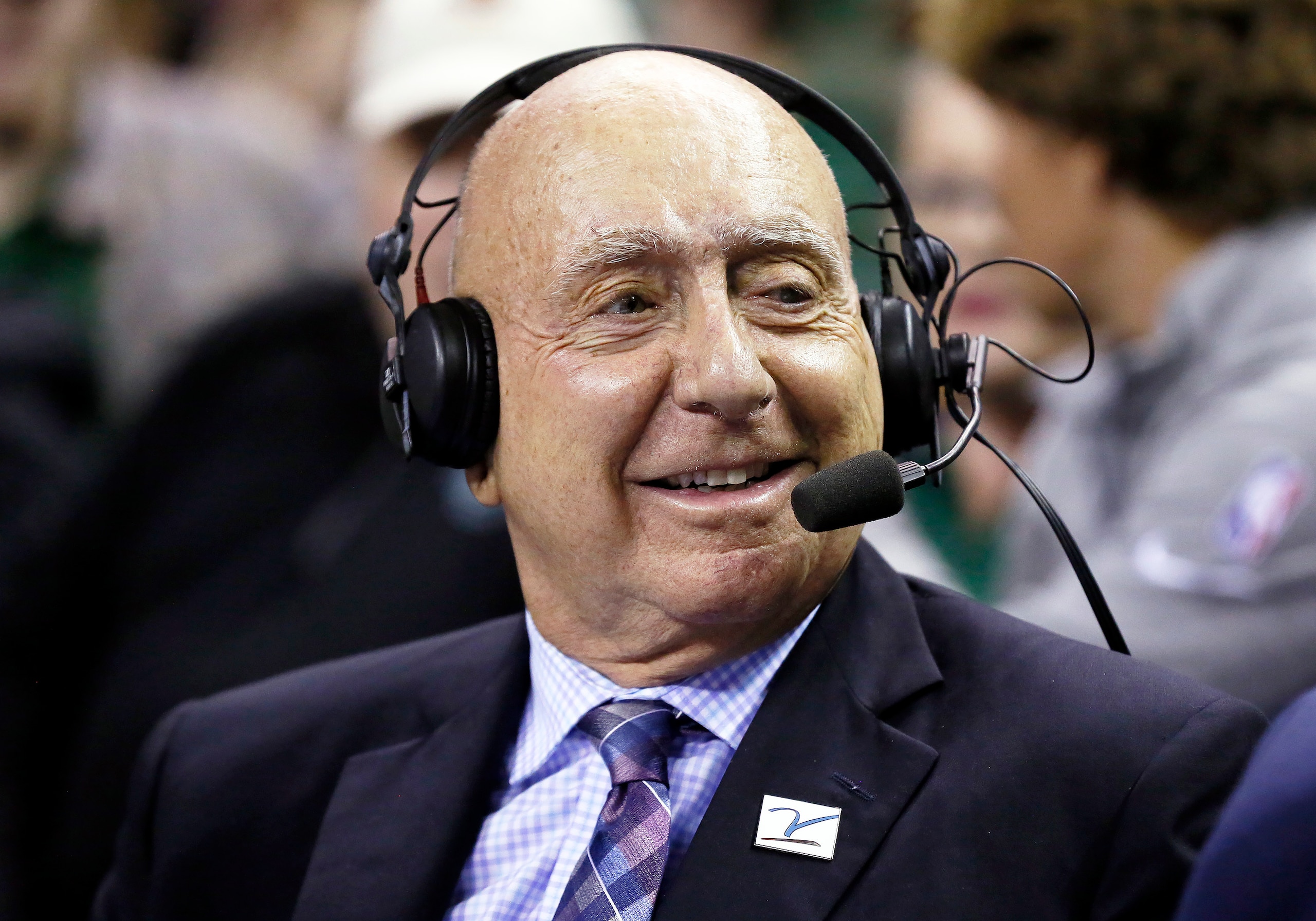 ABC/ESPN basketball analyst Dick Vitale sits at midcourt prior to an NCAA college basketball game between Baylor and Villanova, Sunday, Dec. 12, 2021, in Waco, Texas. (AP Photo/Ray Carlin)