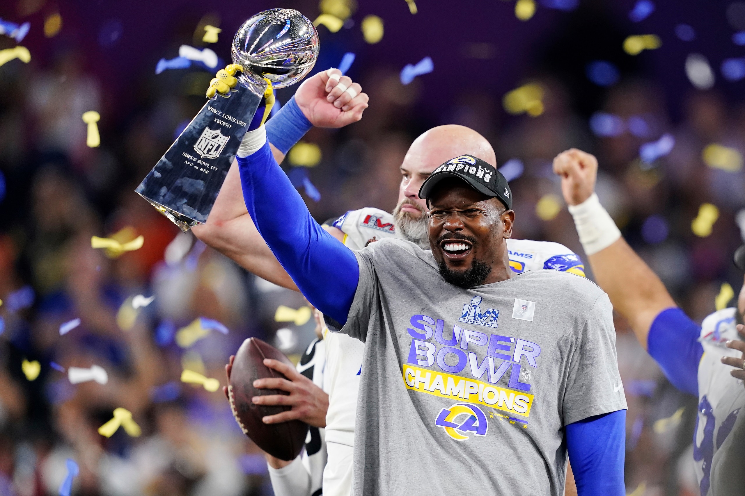 Los Angeles Rams outside linebacker Von Miller (40) holds up the Vince Lombardi trophy after defeating the Cincinnati Bengals at the NFL Super Bowl 56 football game Sunday, Feb. 13, 2022, in Inglewood, Calif. (AP Photo/Steve Luciano)